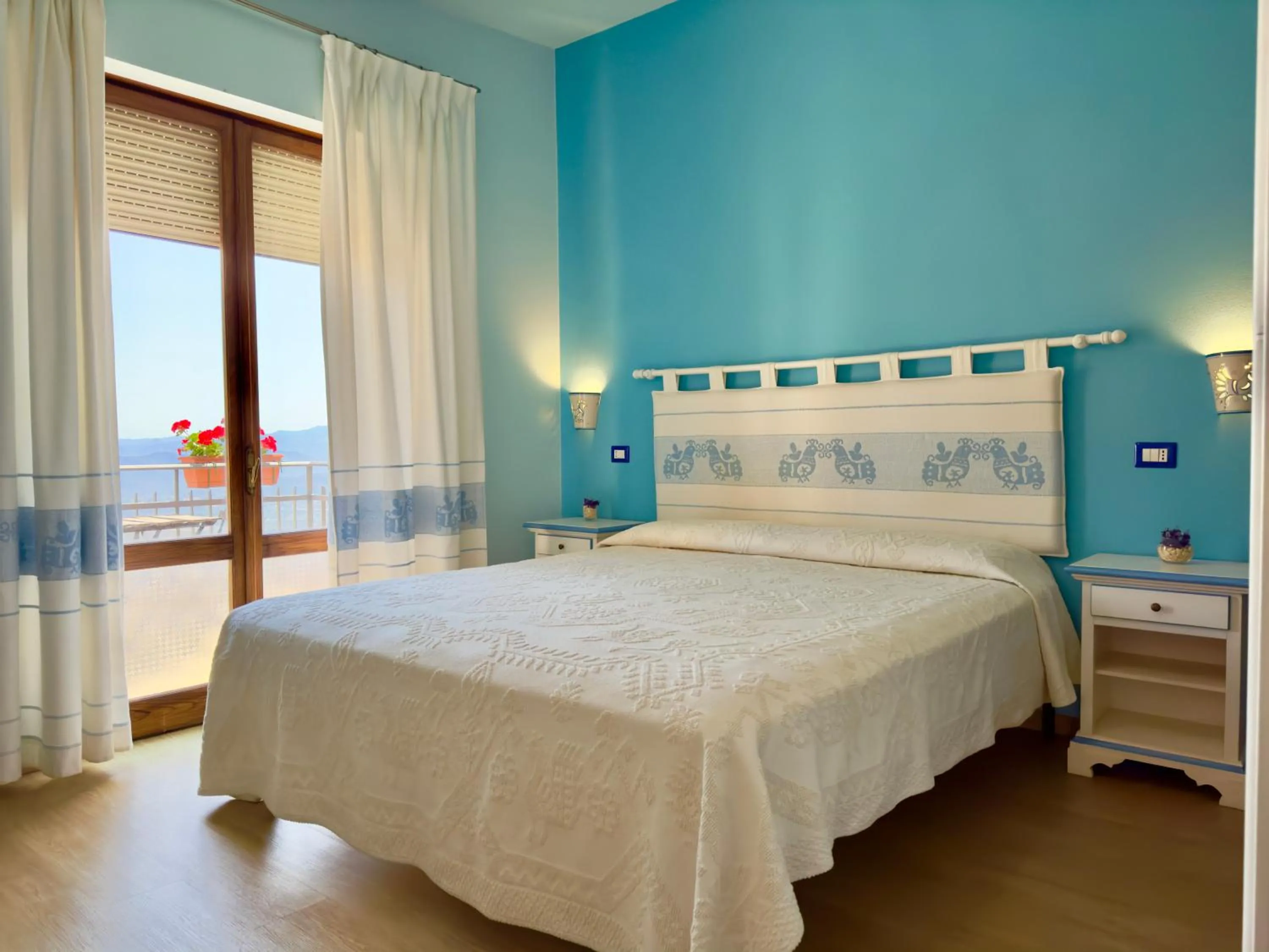 Photo of the whole room, Bed in B&B Selvaggio Blu
