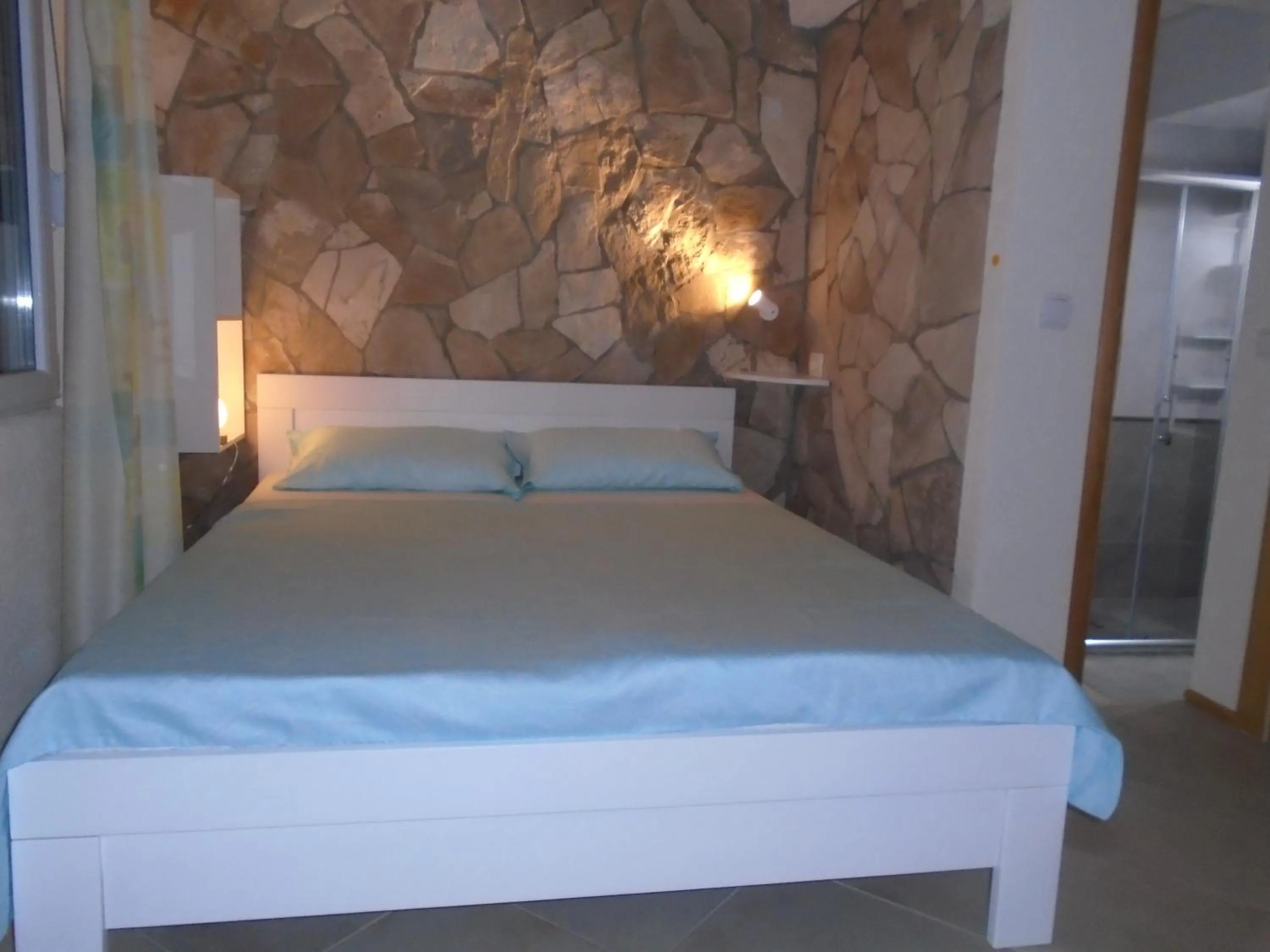 Bed in Apartments Mirian