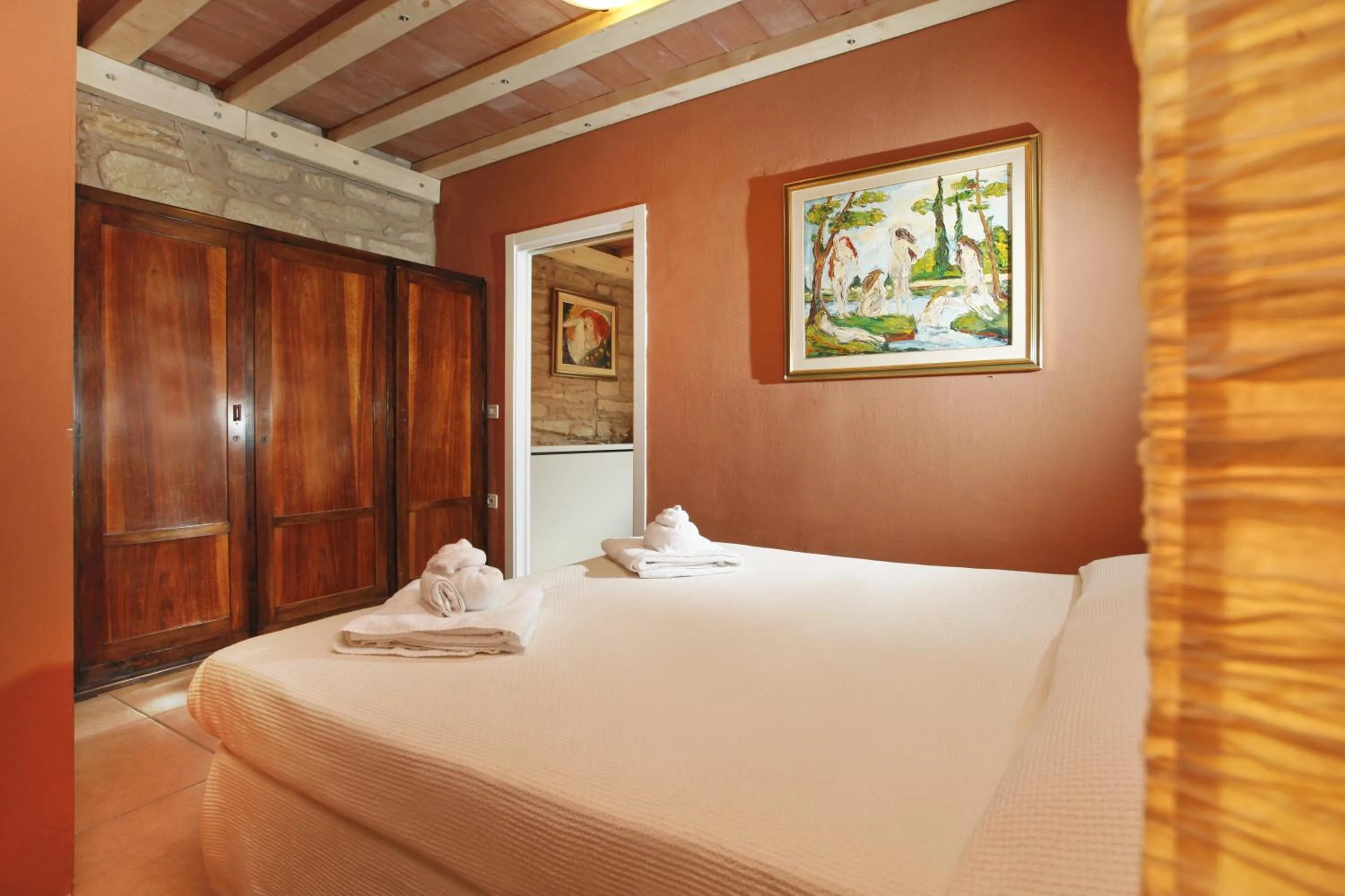 Bed in Albergo Garni Orchidea