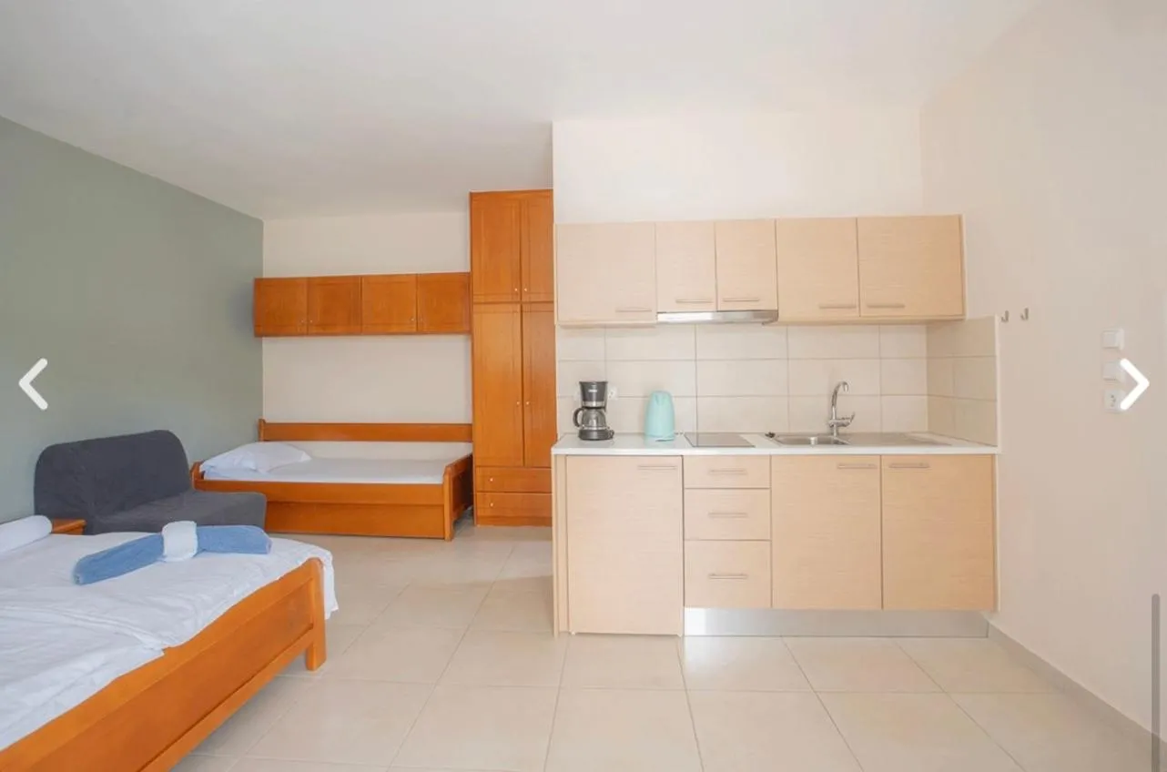 Bed in Geni Garden Apartments