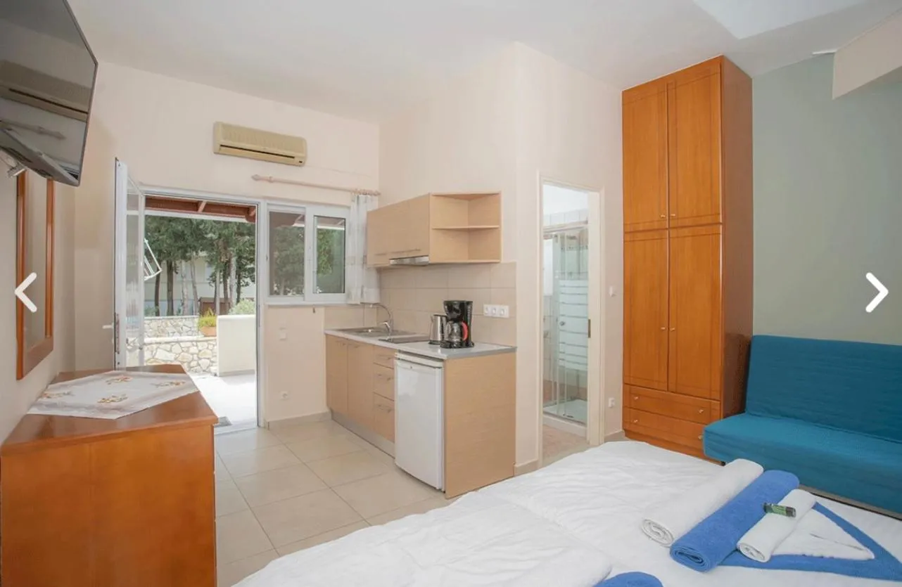 Bed in Geni Garden Apartments