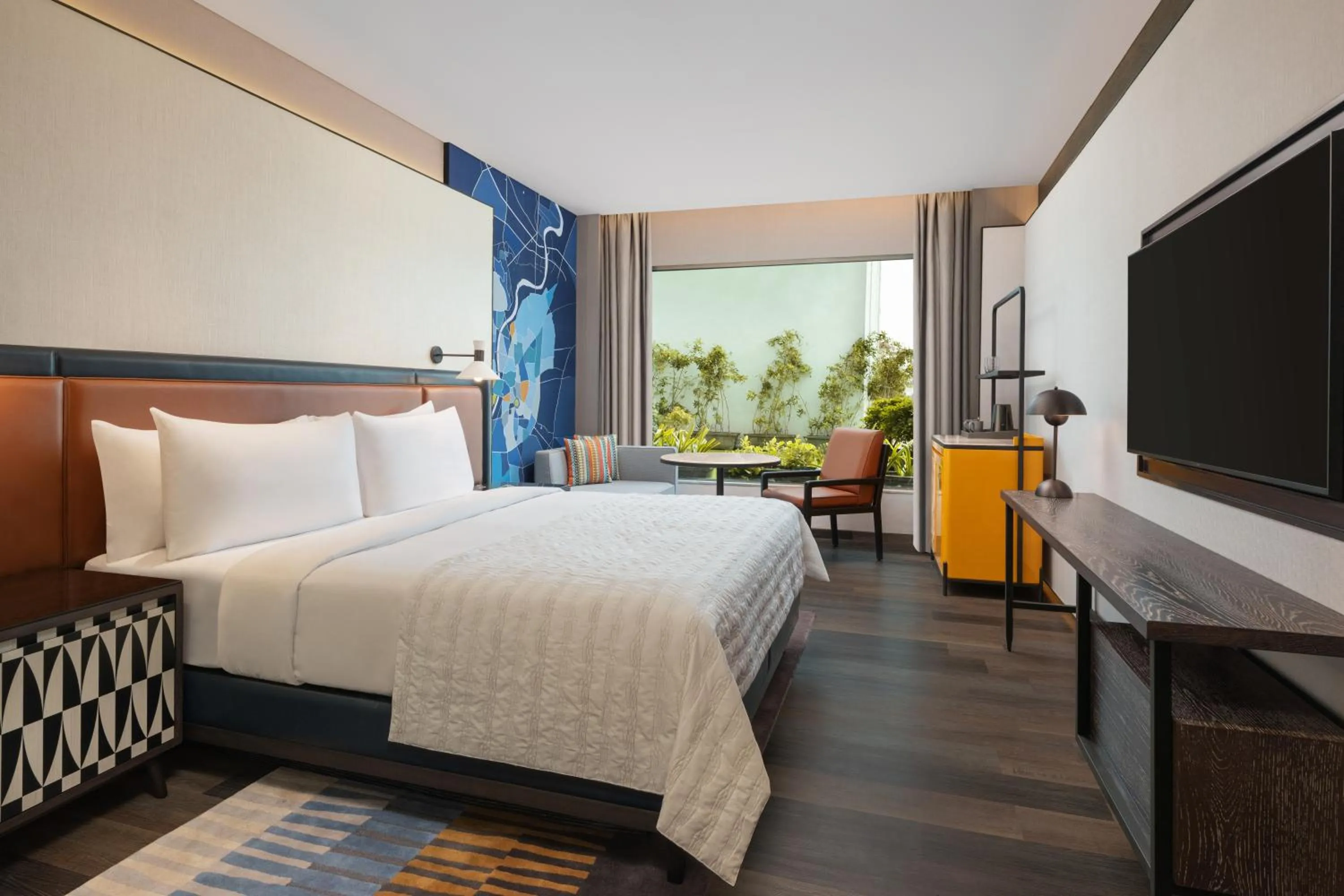 Toilet, Bed in Le Meridien Ahmedabad