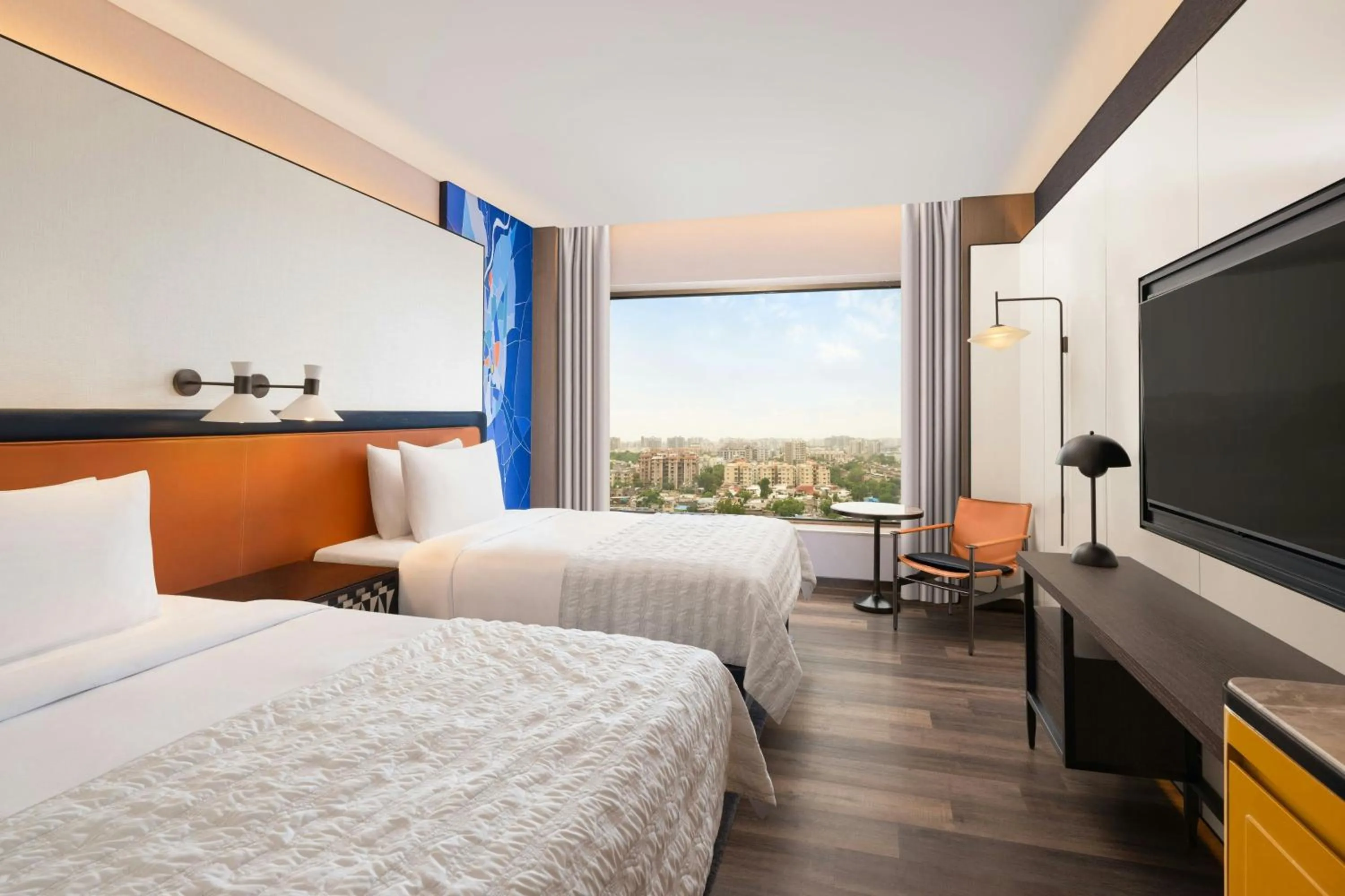 Photo of the whole room, Bed in Le Meridien Ahmedabad