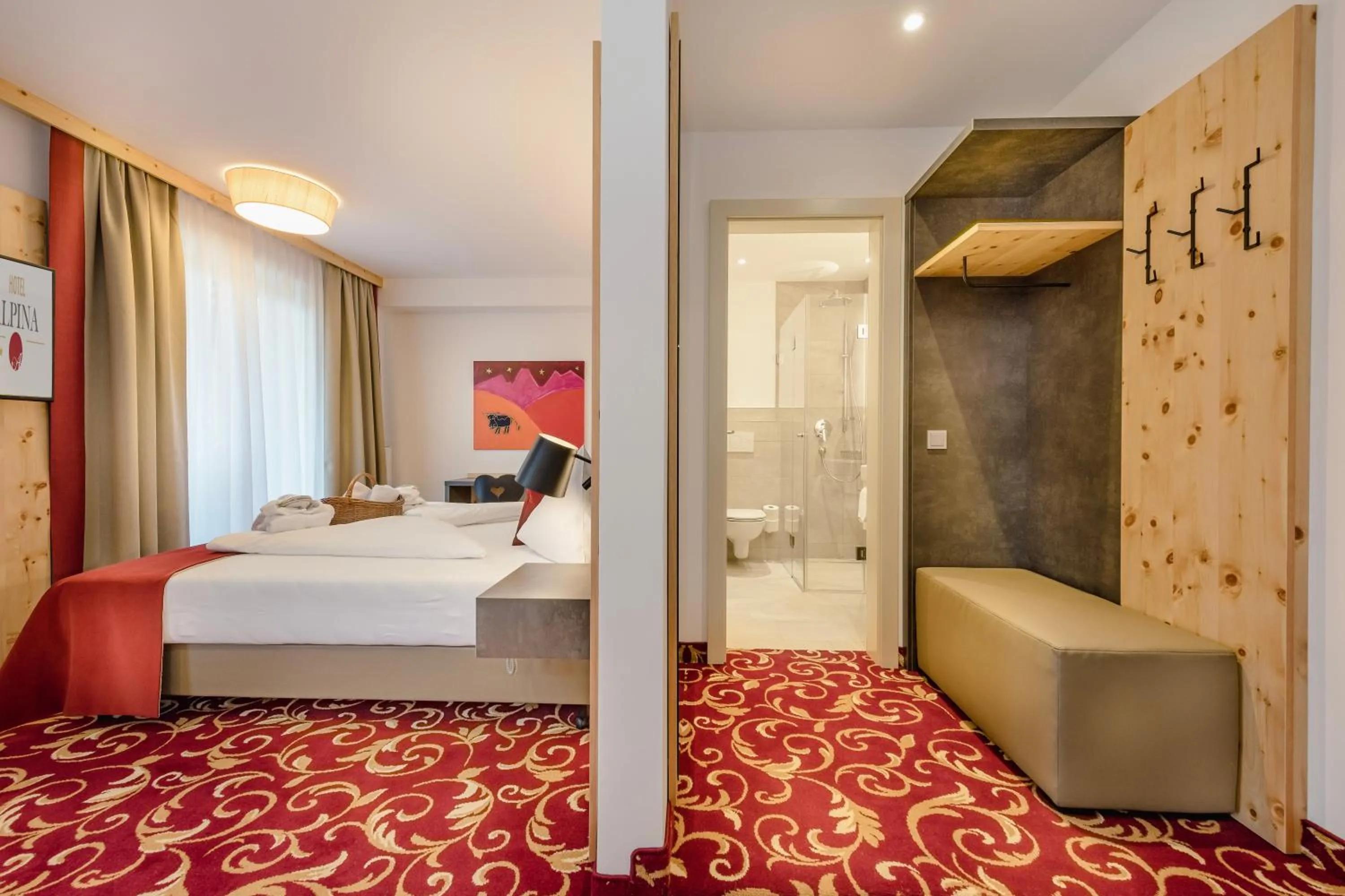 Bathroom, Bed in Hotel Alpina - Thermenhotels Gastein