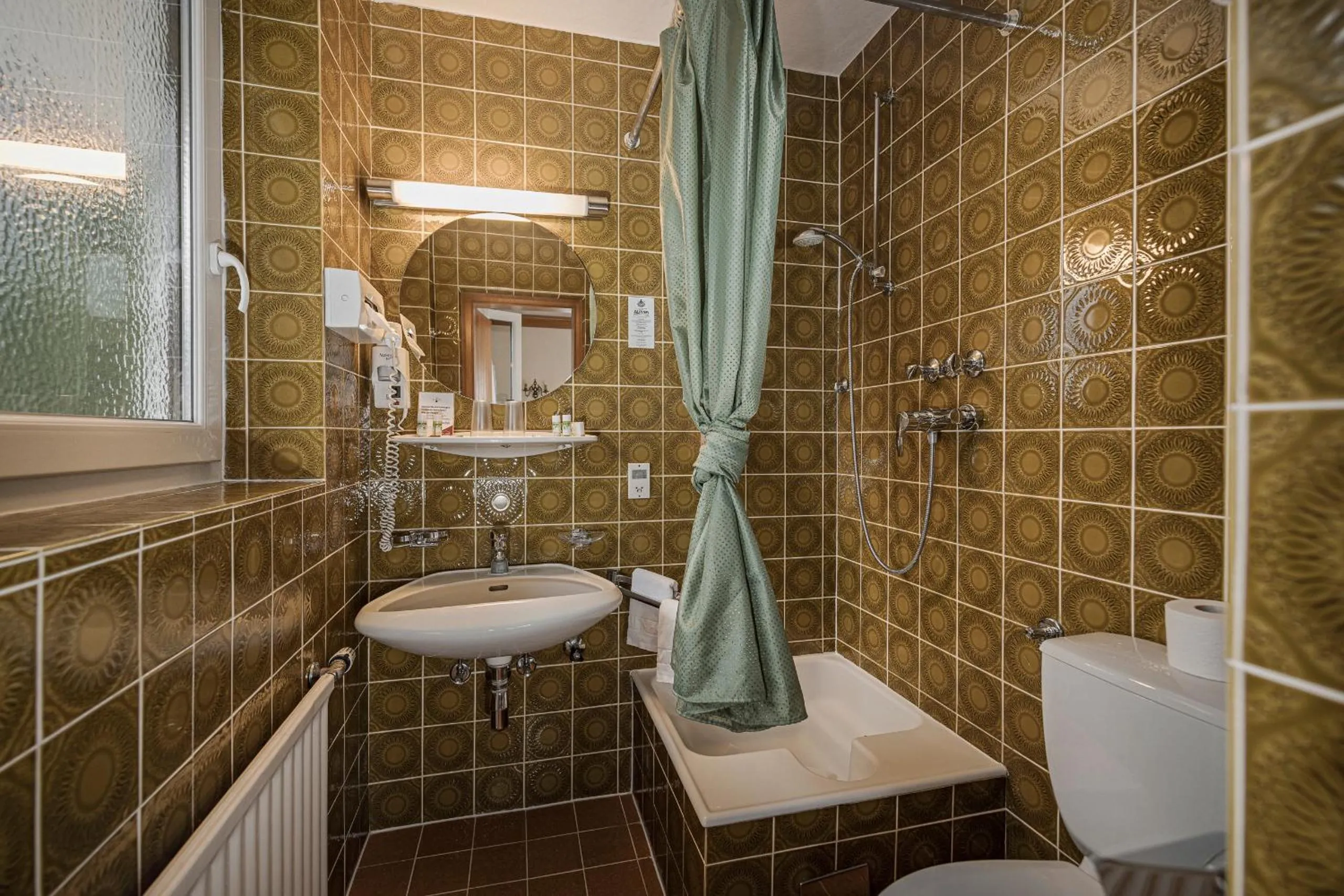 Shower in Hotel Alpina - Thermenhotels Gastein
