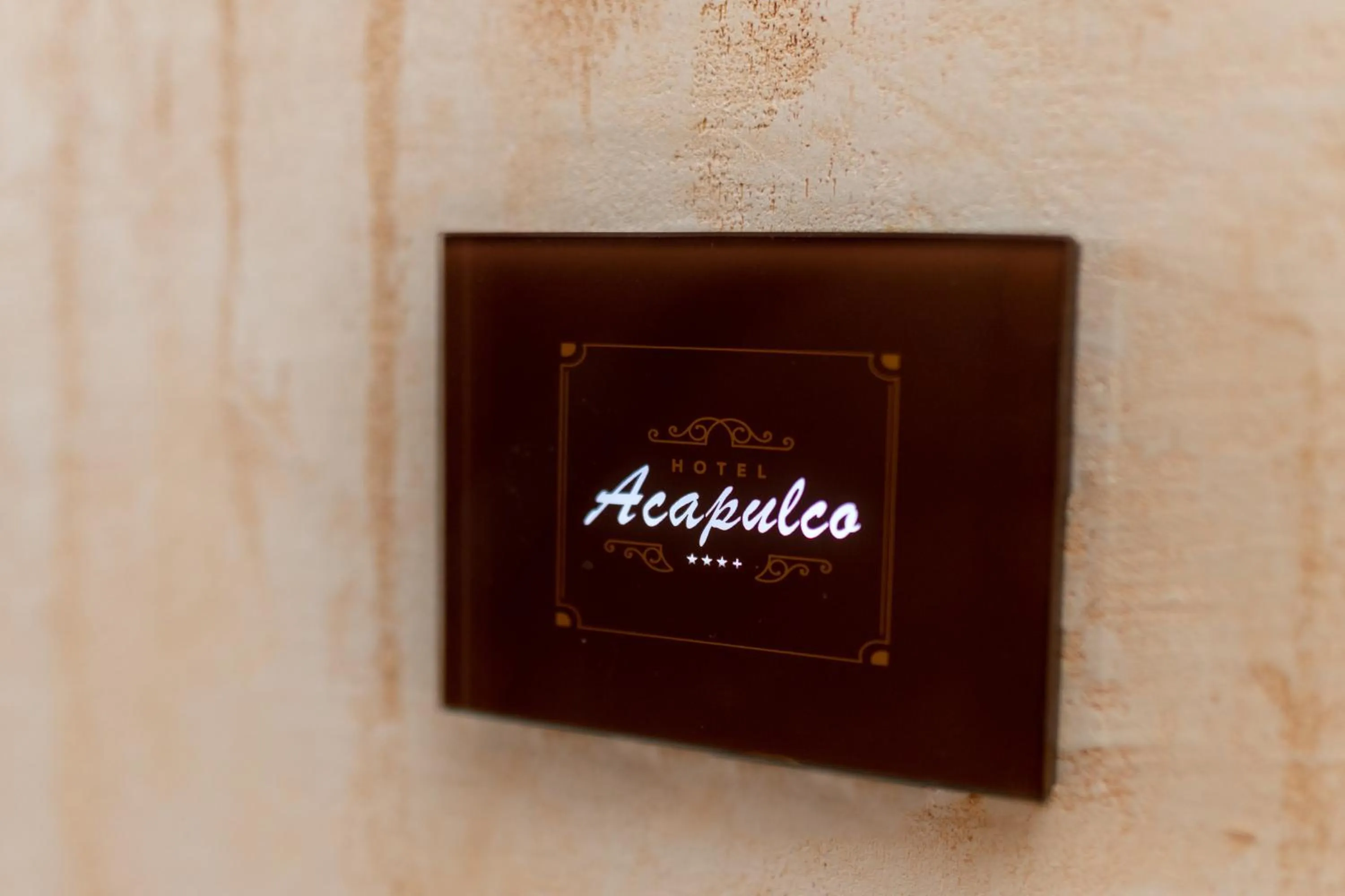 Property logo or sign in Acapulco Hotel