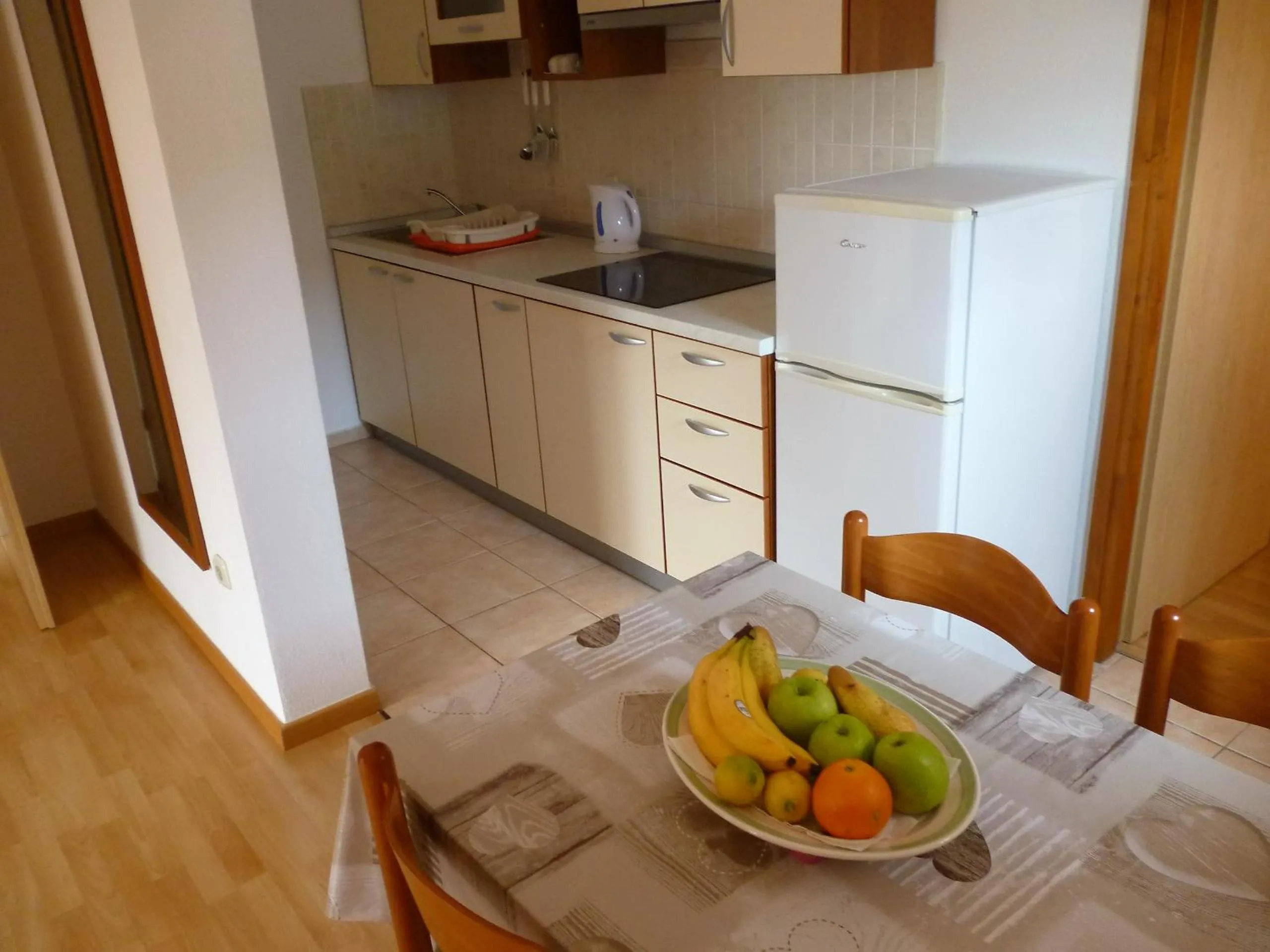 Kitchen or kitchenette in Apartments Pjer