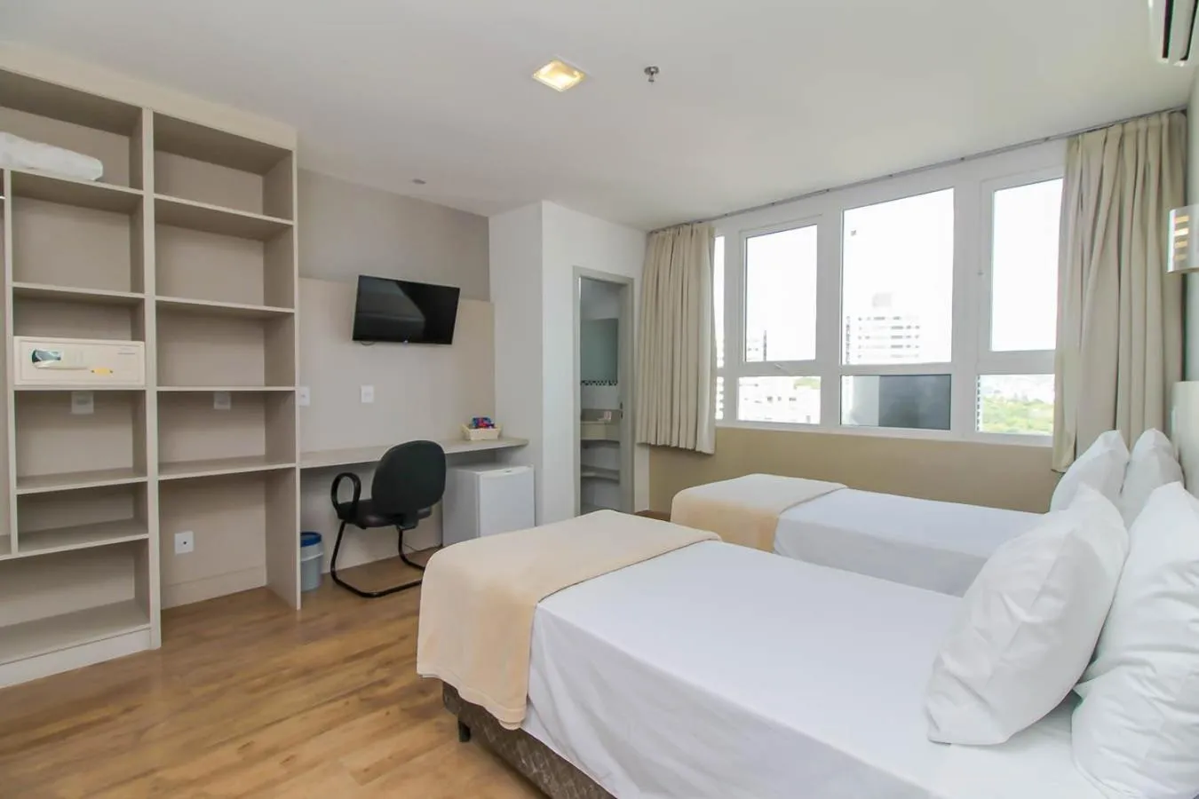 Bed in Coral Trade Hotel