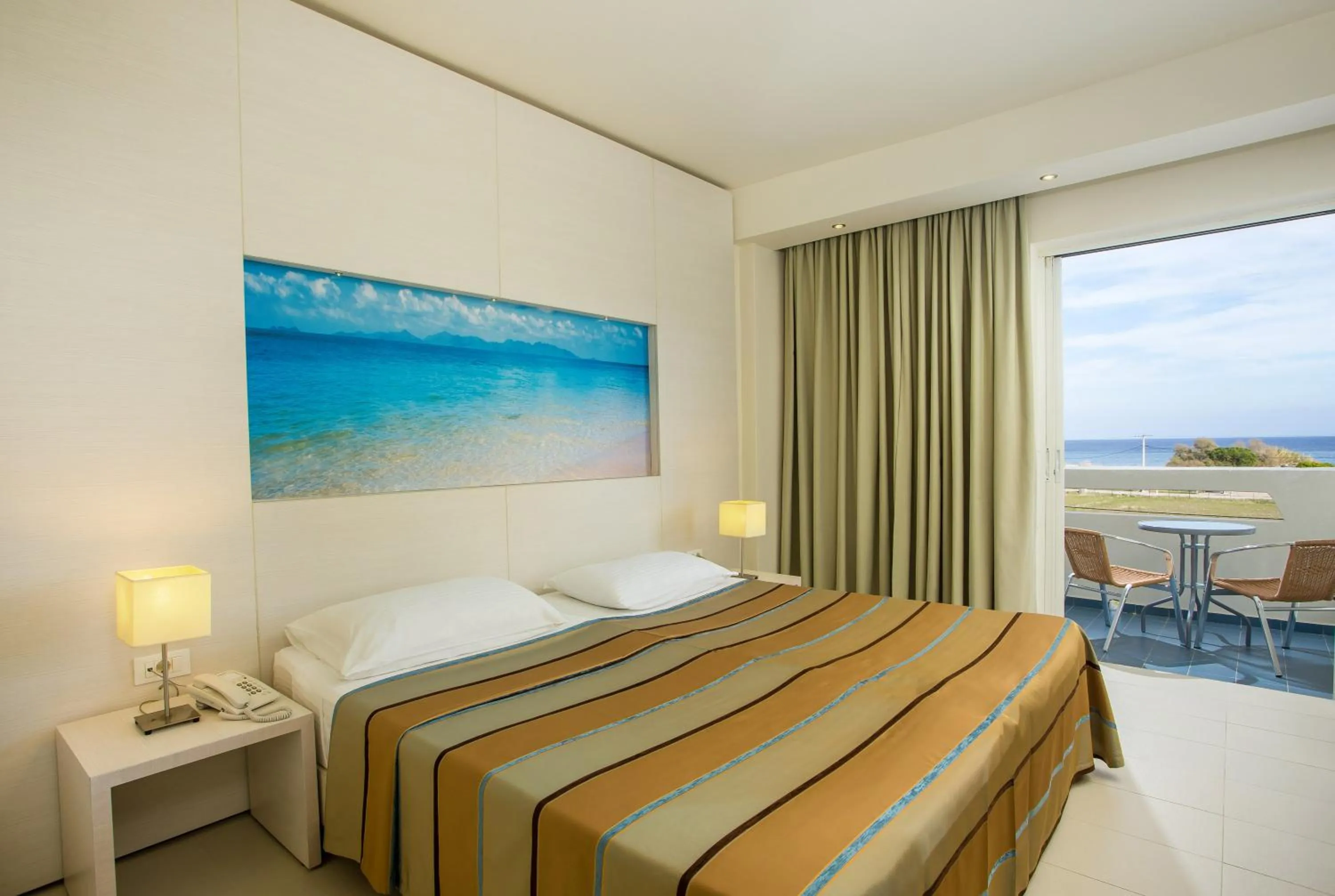 Photo of the whole room, Bed in Lindos White Hotel & Suites