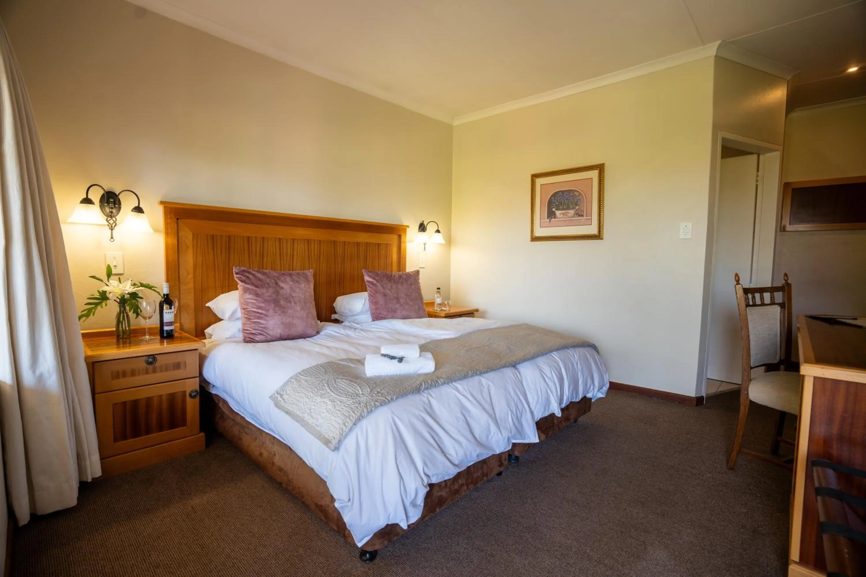 Bed in Little Tuscany Boutique Hotel