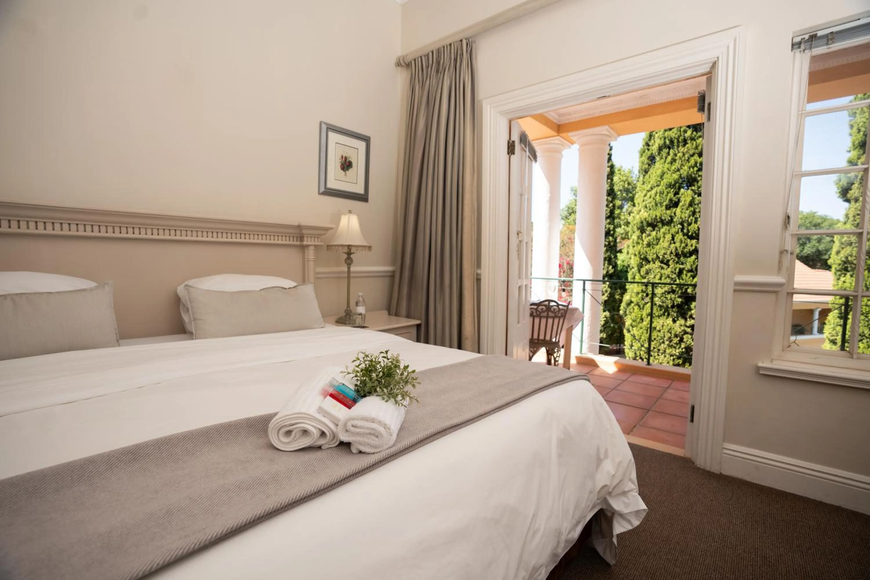 Bed in Little Tuscany Boutique Hotel