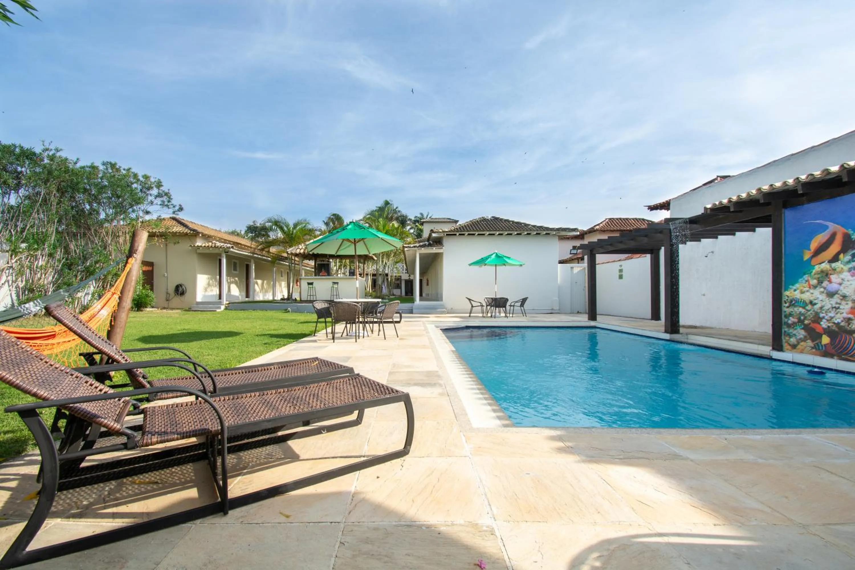 Swimming pool in Pousada Casuarina Ferradura