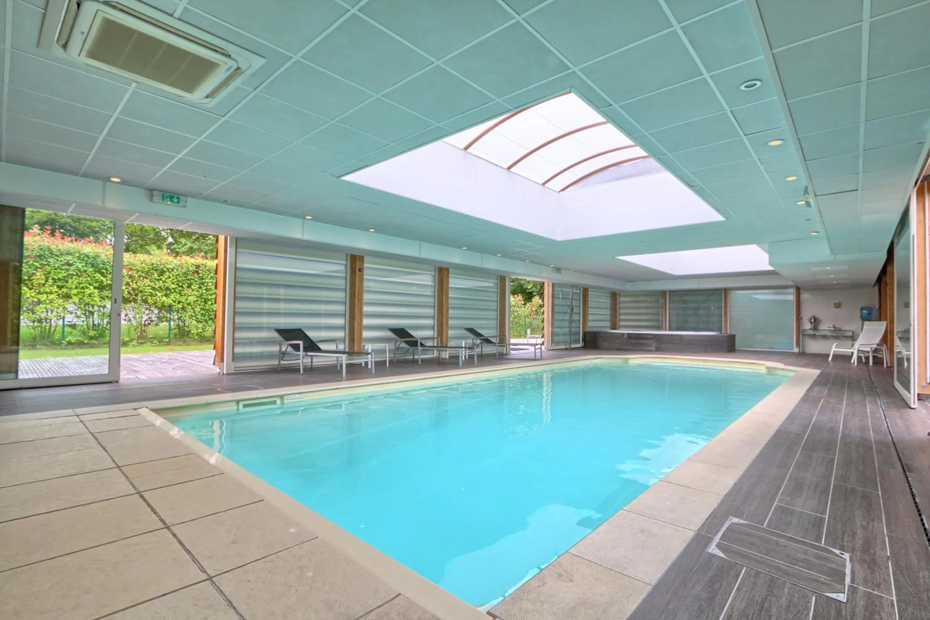 Swimming pool in Le Relais de La Malmaison, a member of Radisson Individuals