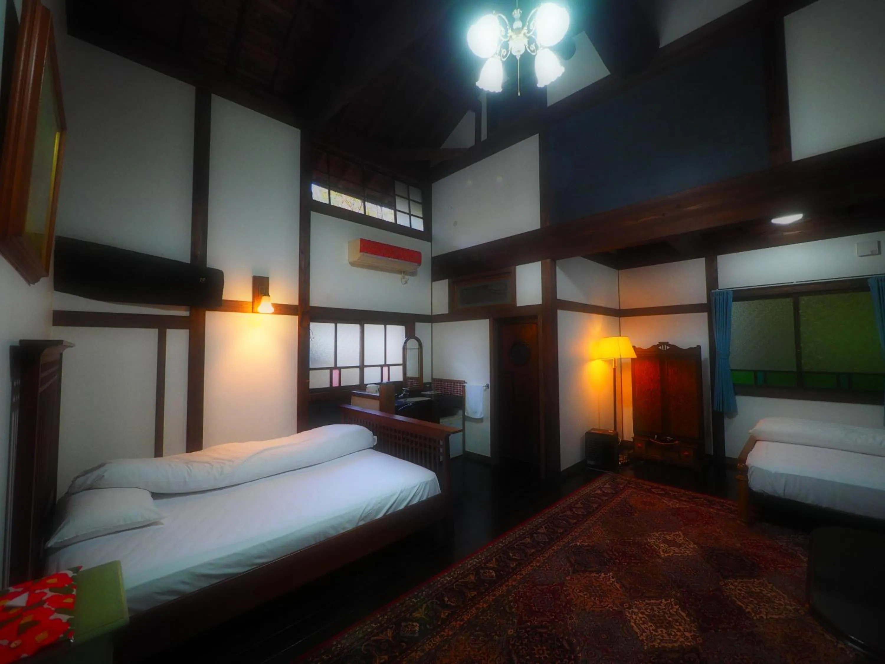 Bed in Kotohira Guest House en
