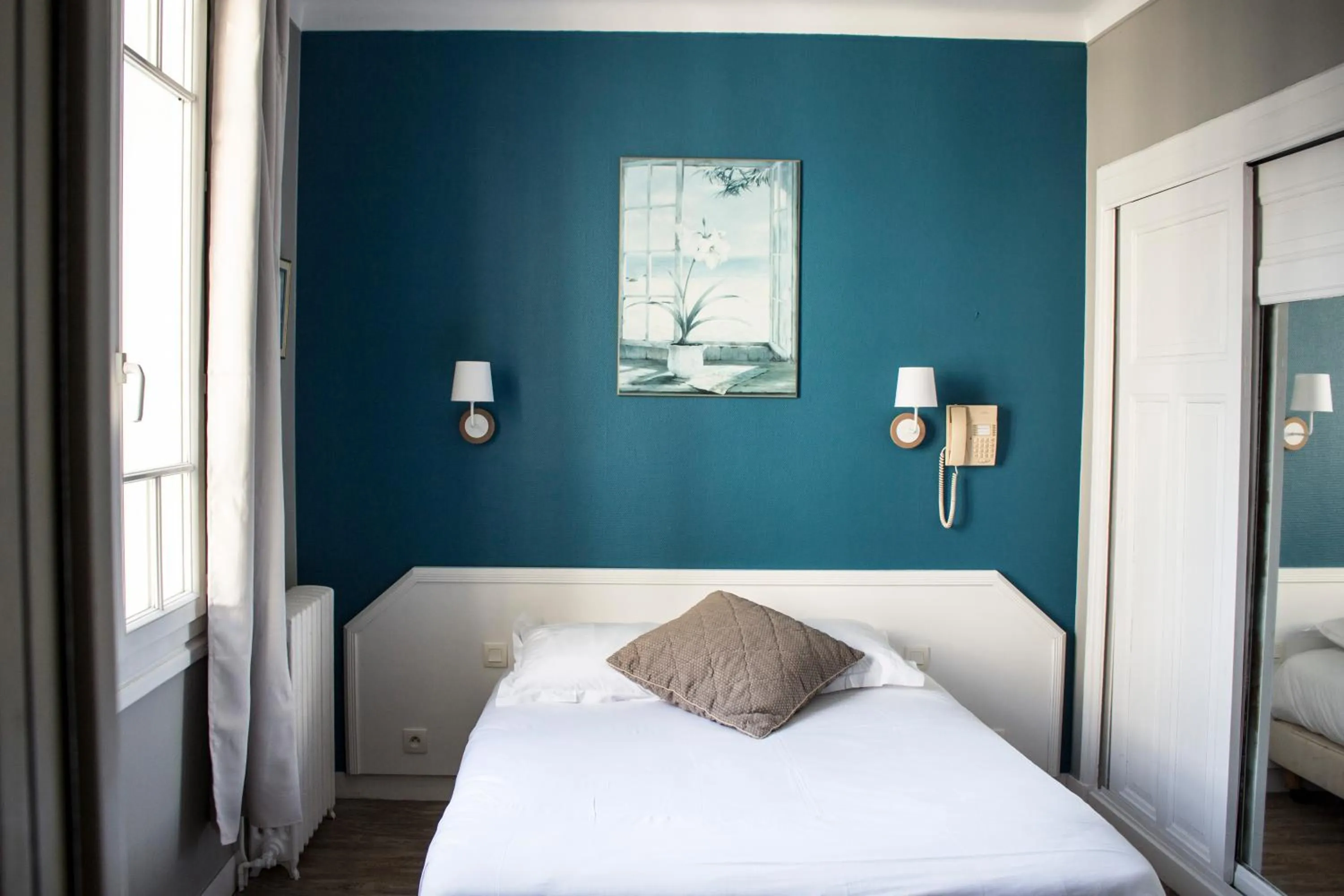 Bed in Hotel Le Reynita