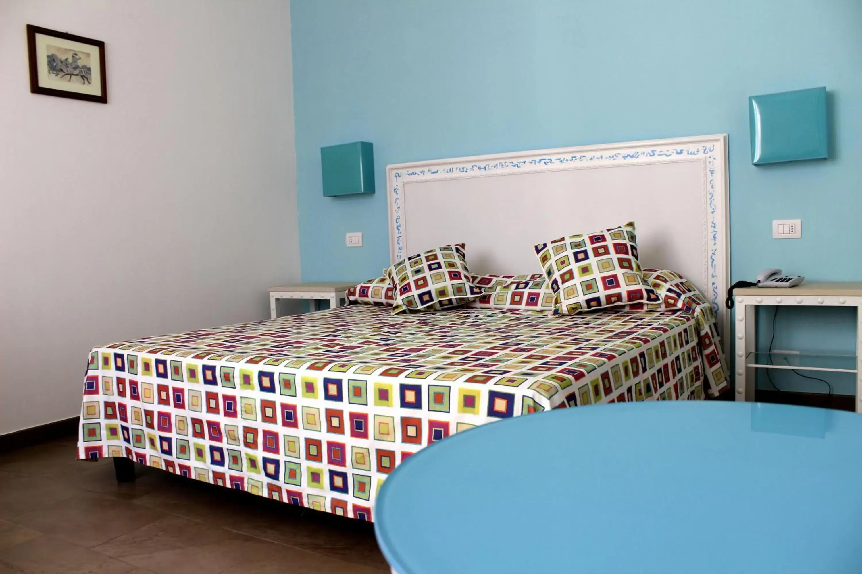 Family Room (2 Adults + 1 Child) in Hotel O'scià Family Room (2 Adults + 1 Child) in Hotel O'scià