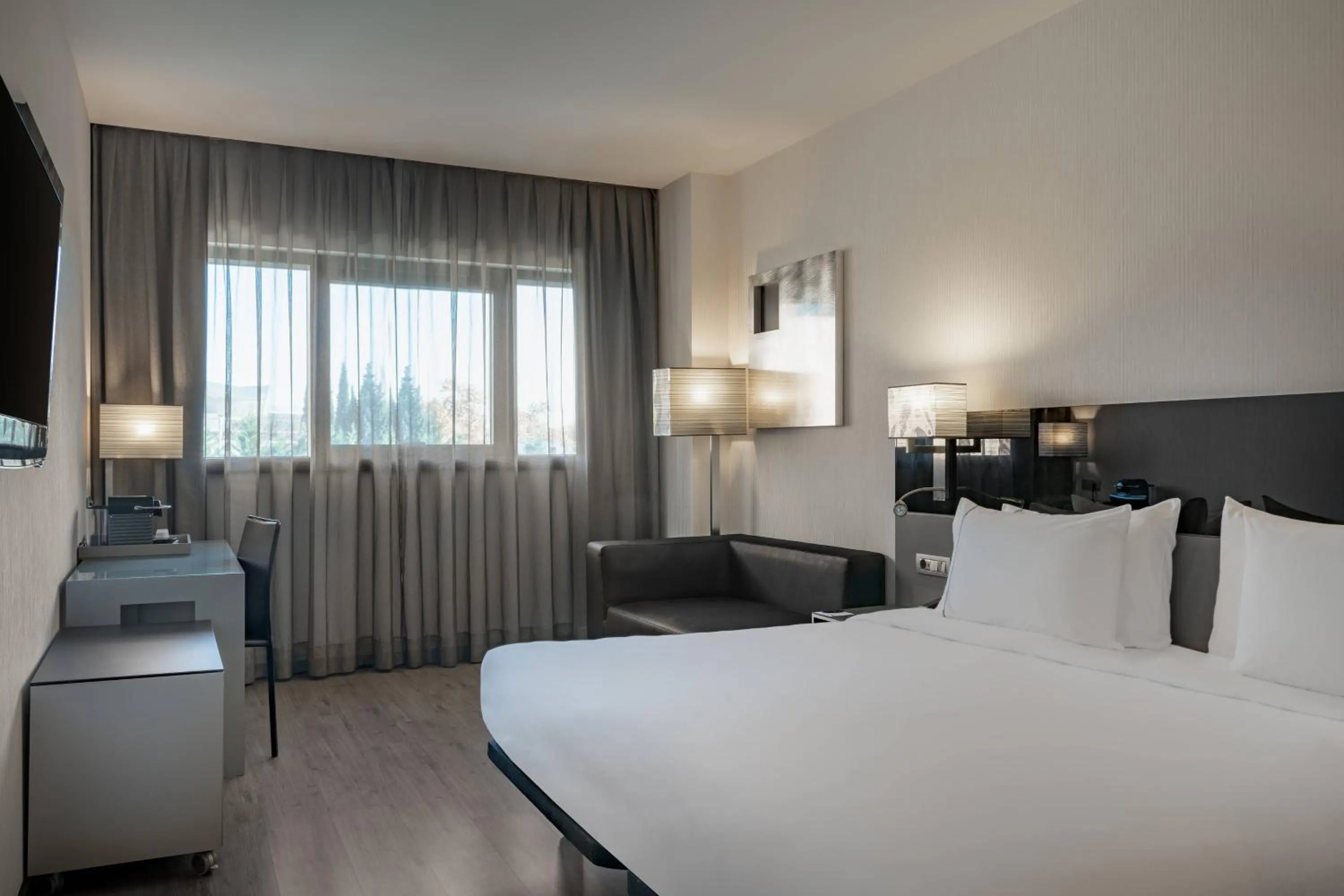 Photo of the whole room, Bed in AC Hotel Atocha by Marriott