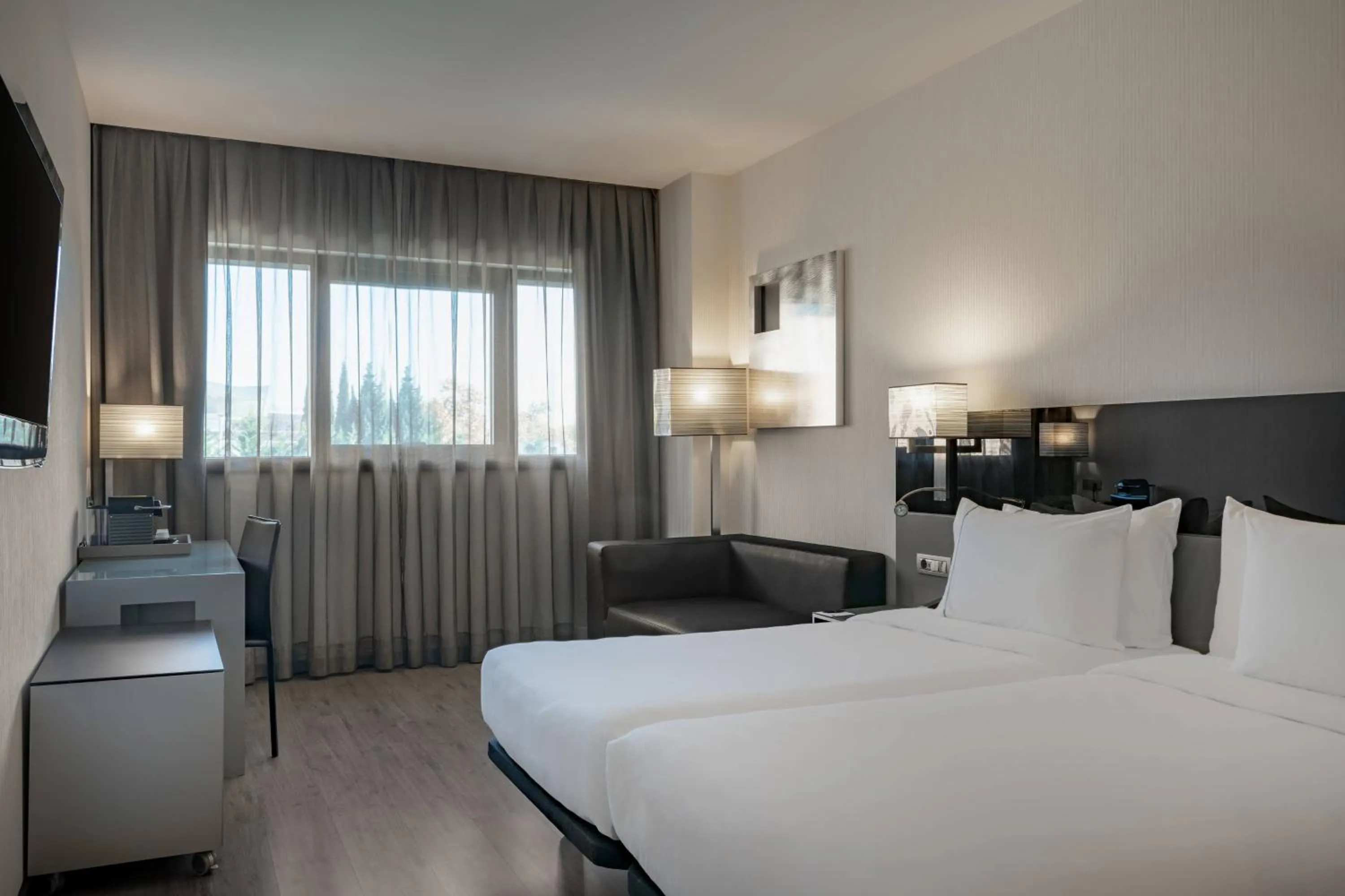 Photo of the whole room, Bed in AC Hotel Atocha by Marriott