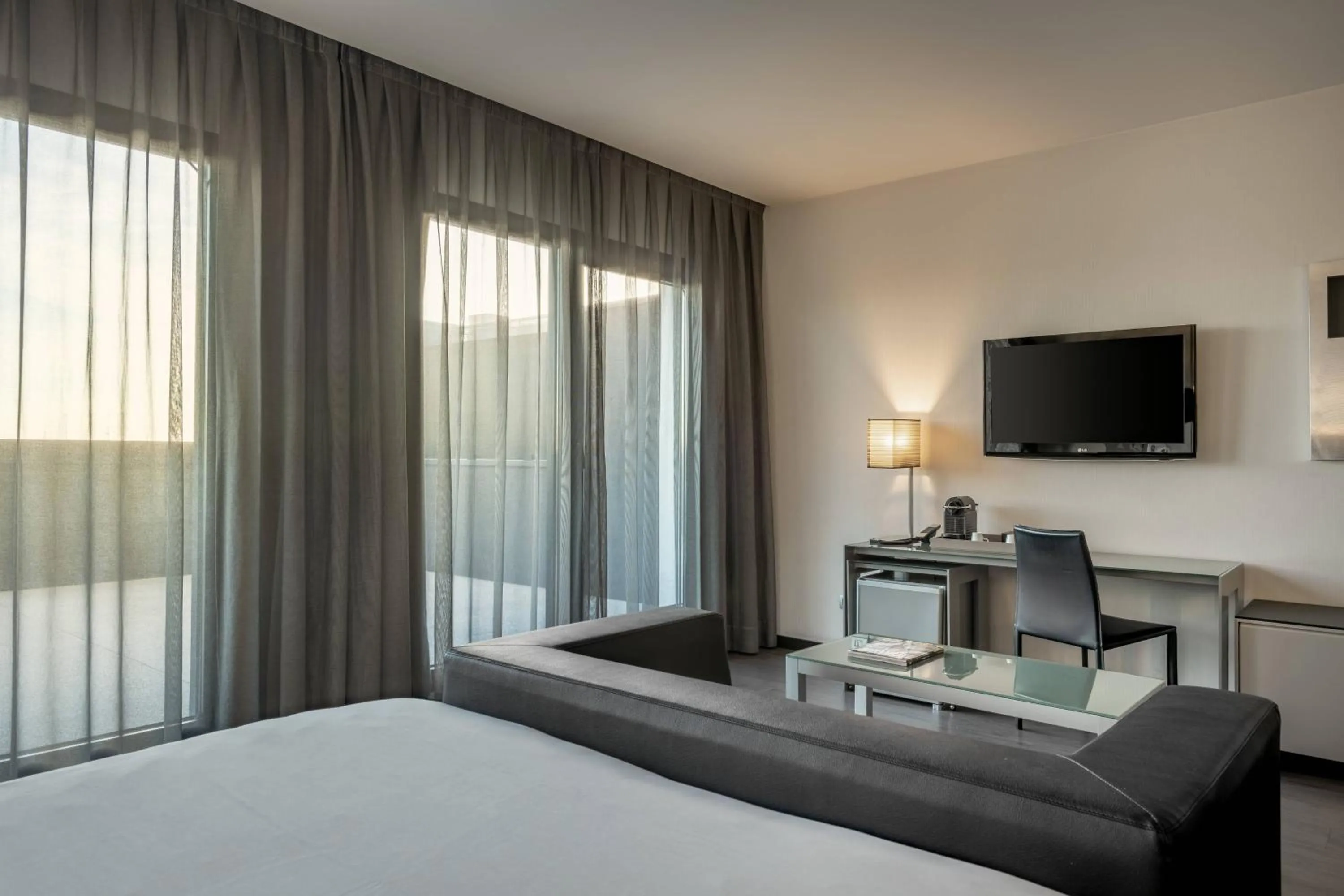 Photo of the whole room, Bed in AC Hotel Atocha by Marriott