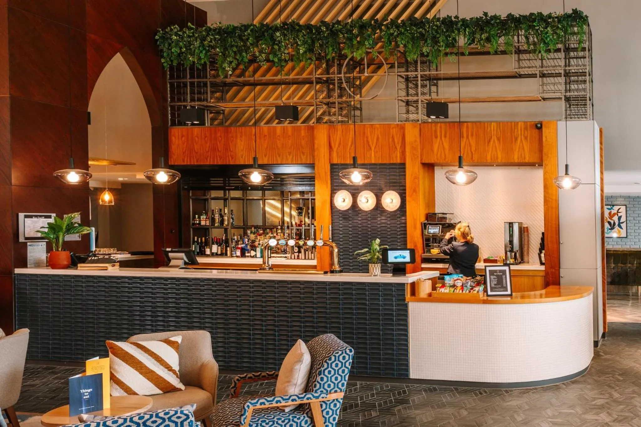 Lounge or bar in voco Winchester Hotel & Spa by IHG