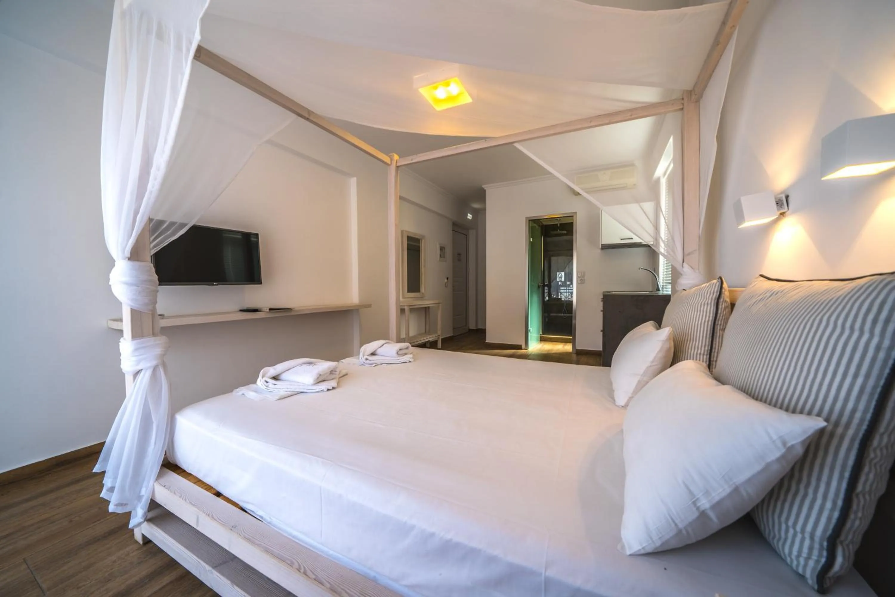 Bed in Porto Kalamaki Hotel