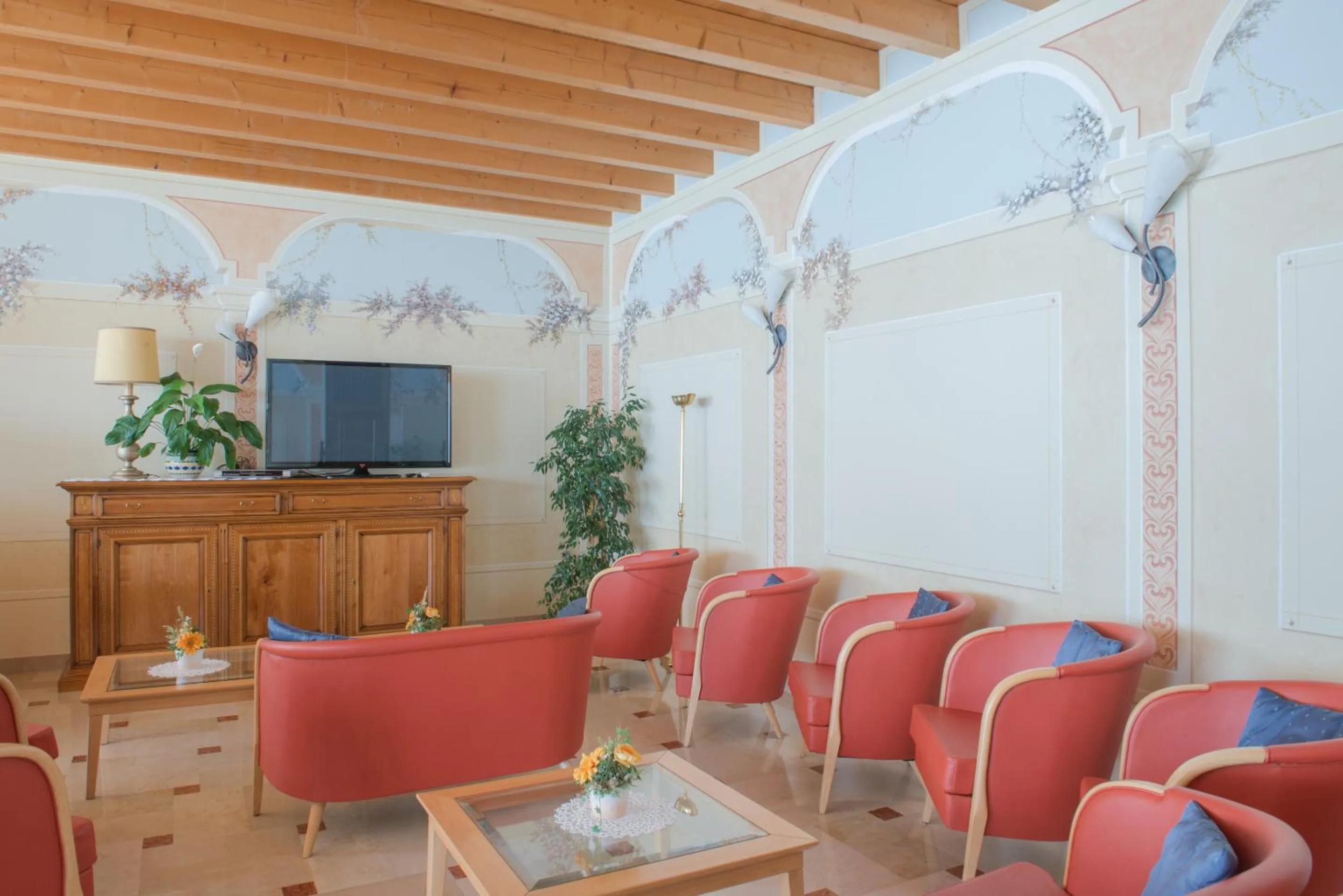 Communal lounge/ TV room in Village Hotel Lucia