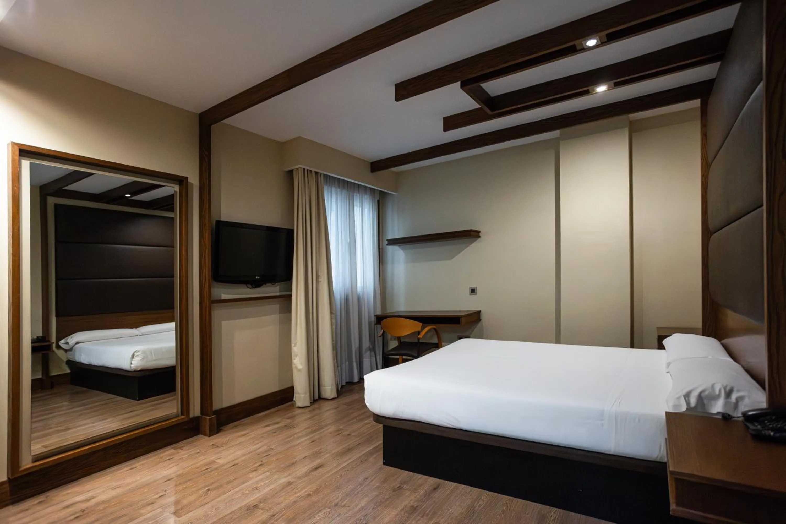 Bed in Hotel Centro Los Braseros