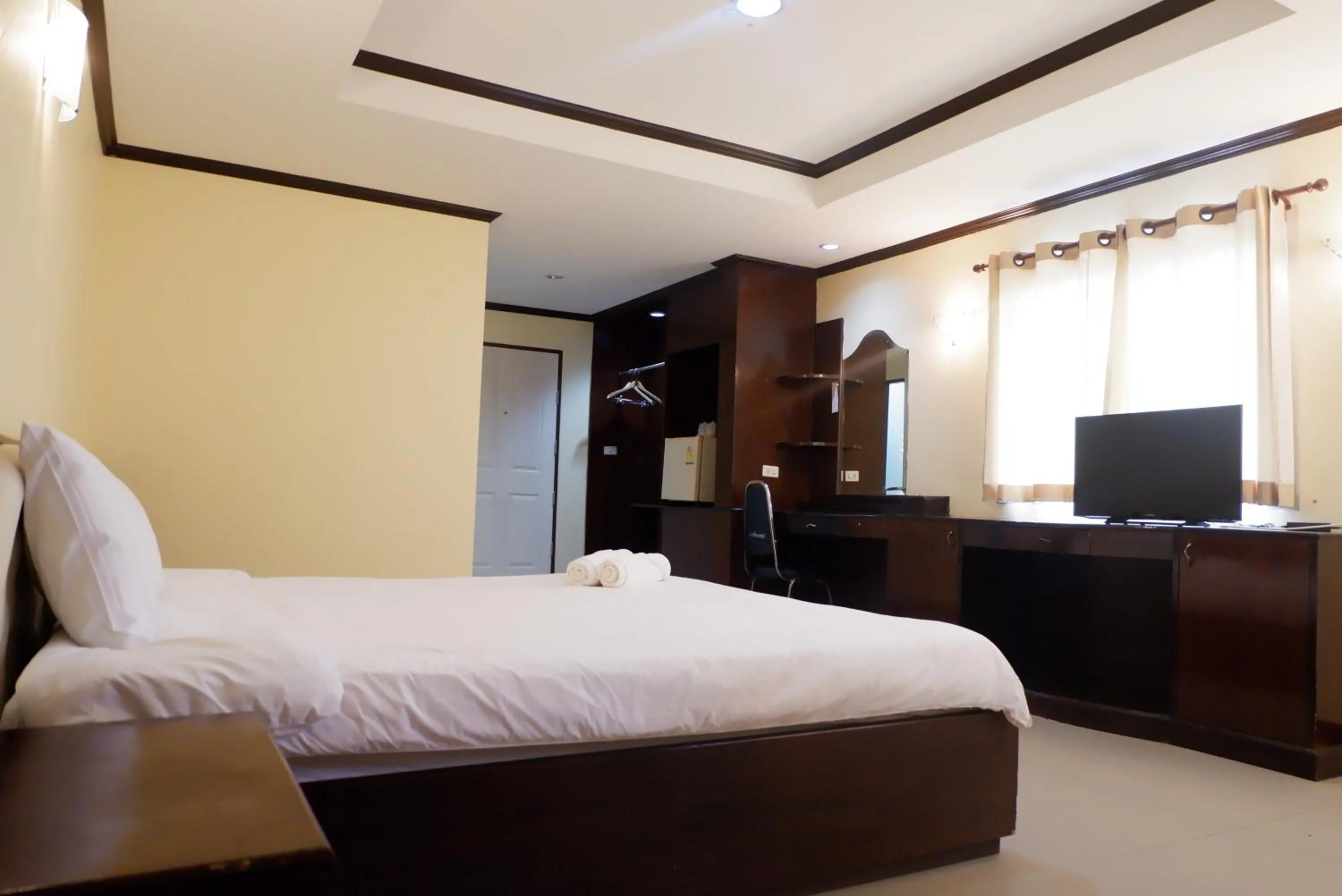 Bed in Auychai Grand Hotel