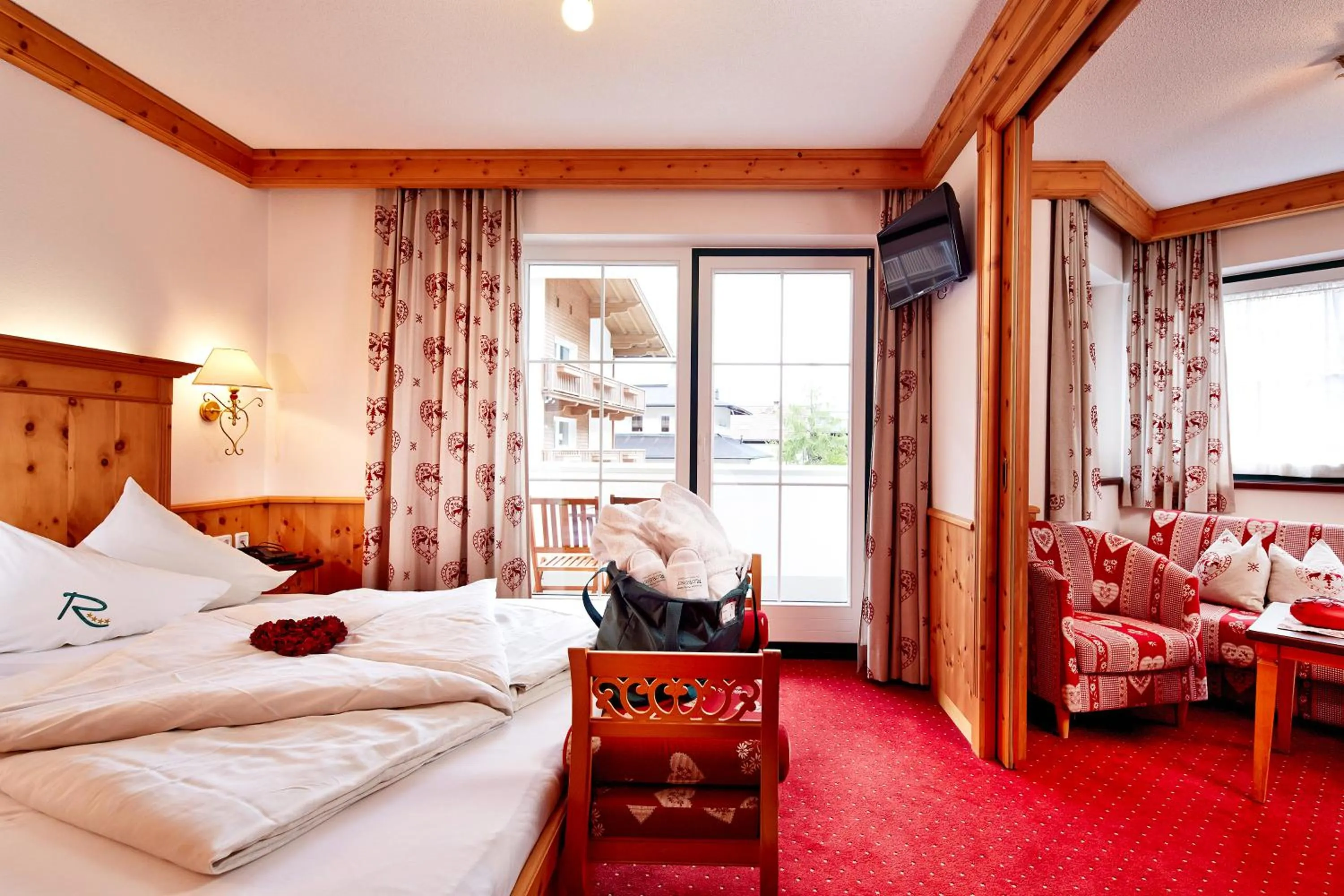 Photo of the whole room, Bed in Sylvana's Wohlfühl Hotel