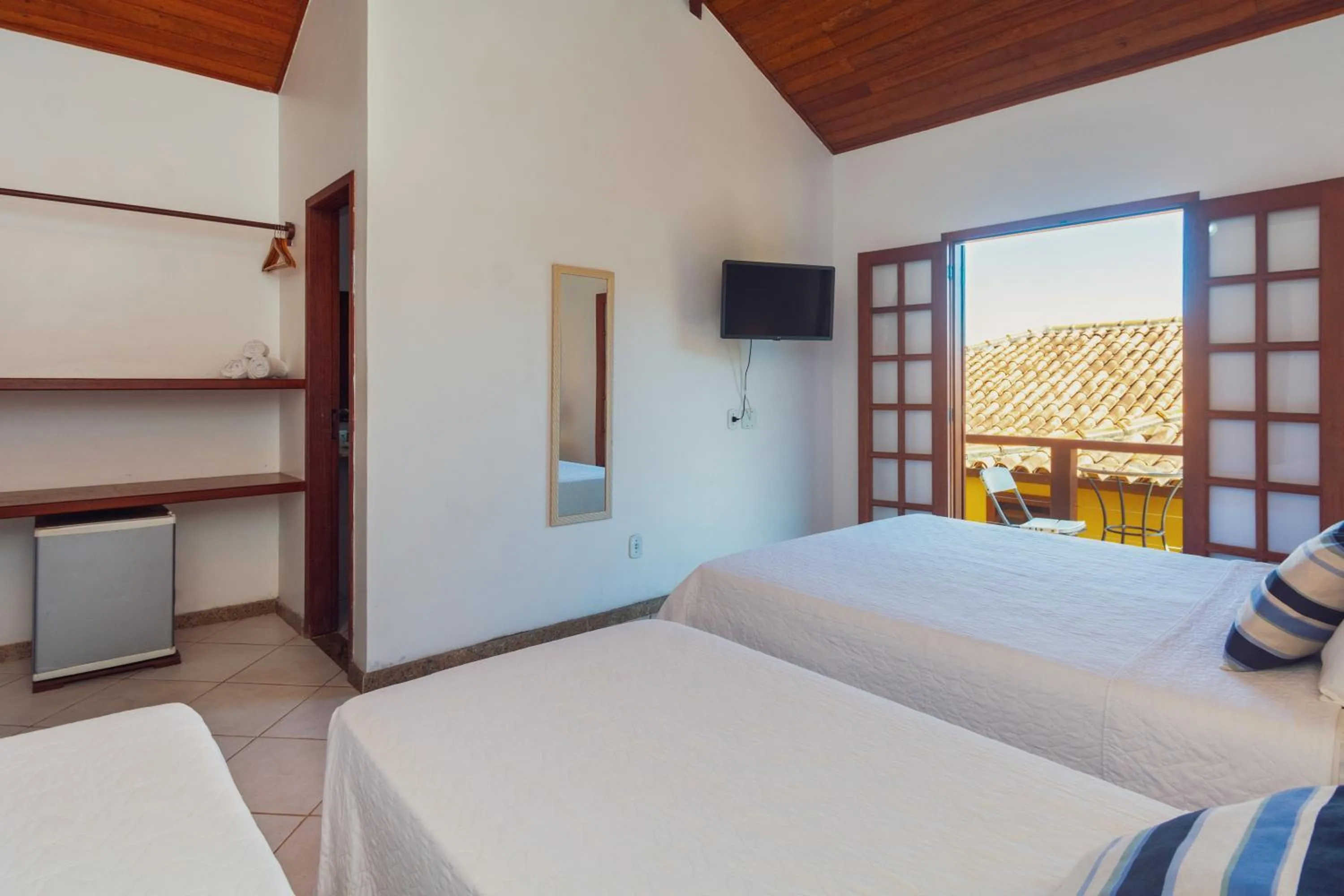 Bed in Pousada MAR João Fernandes