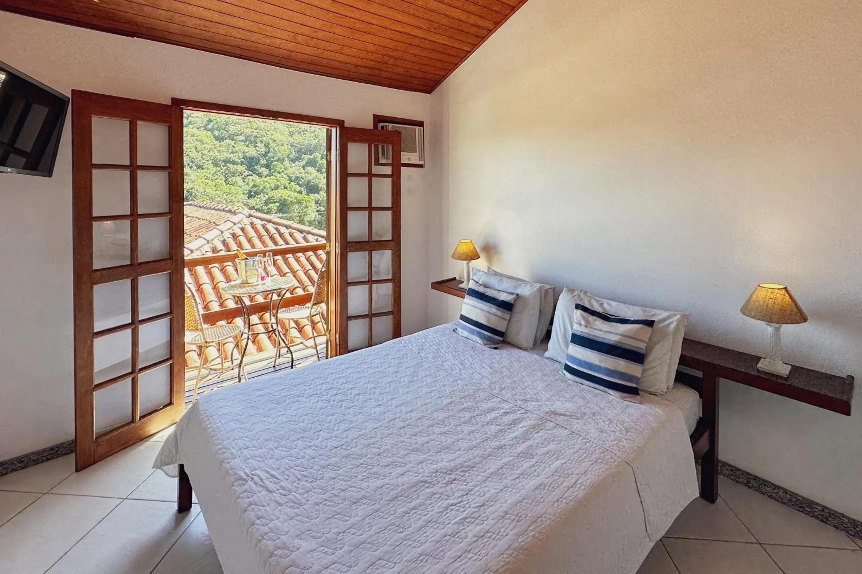 Bed in Pousada MAR João Fernandes