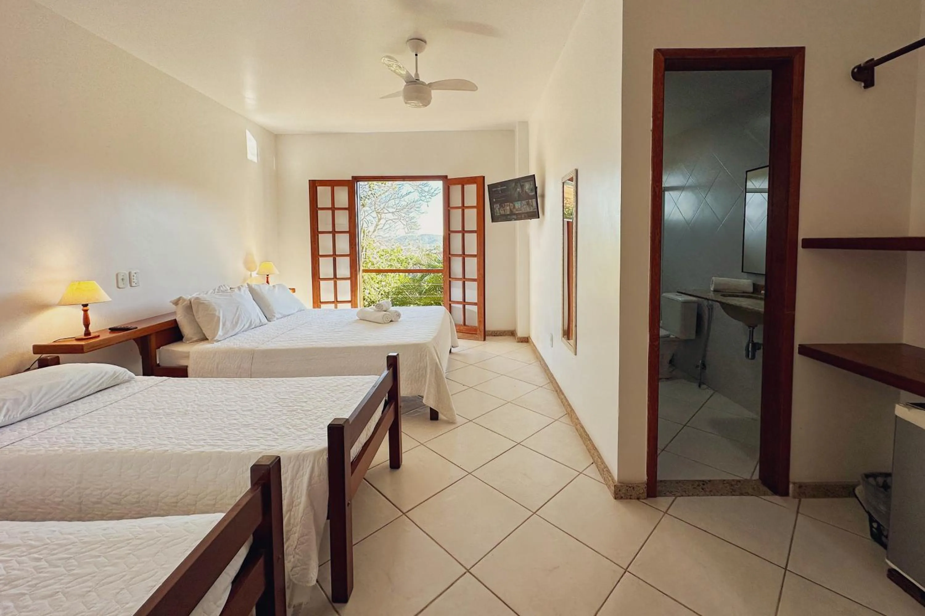 Bed in Pousada MAR João Fernandes