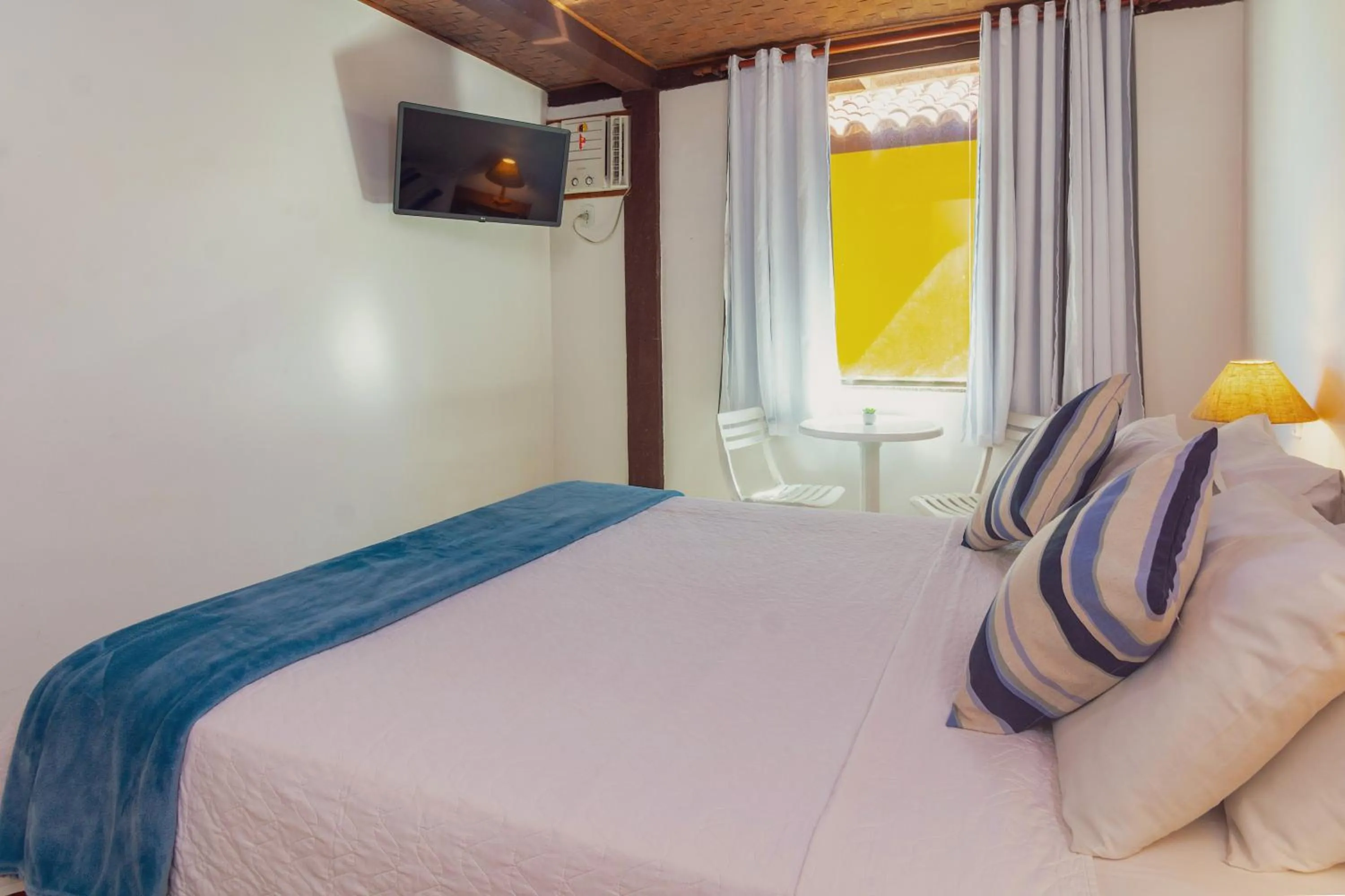 Bed in Pousada MAR João Fernandes