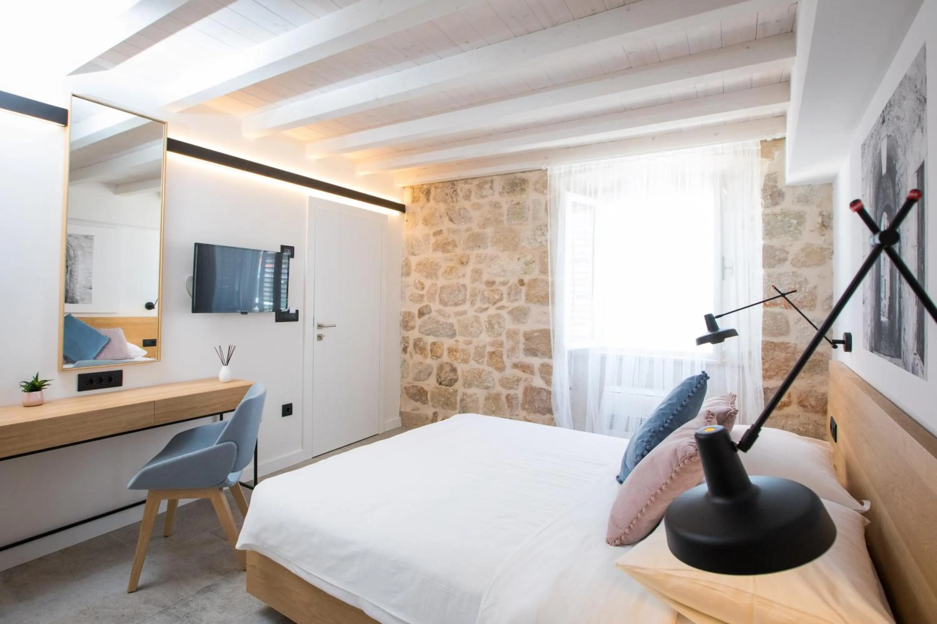 Bed in Bova Luxury Rooms