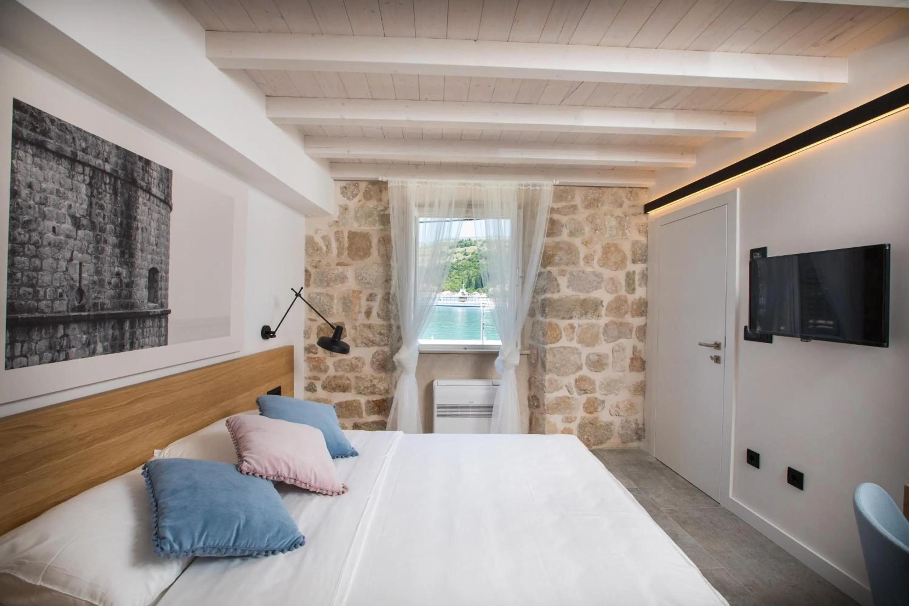 Bed in Bova Luxury Rooms