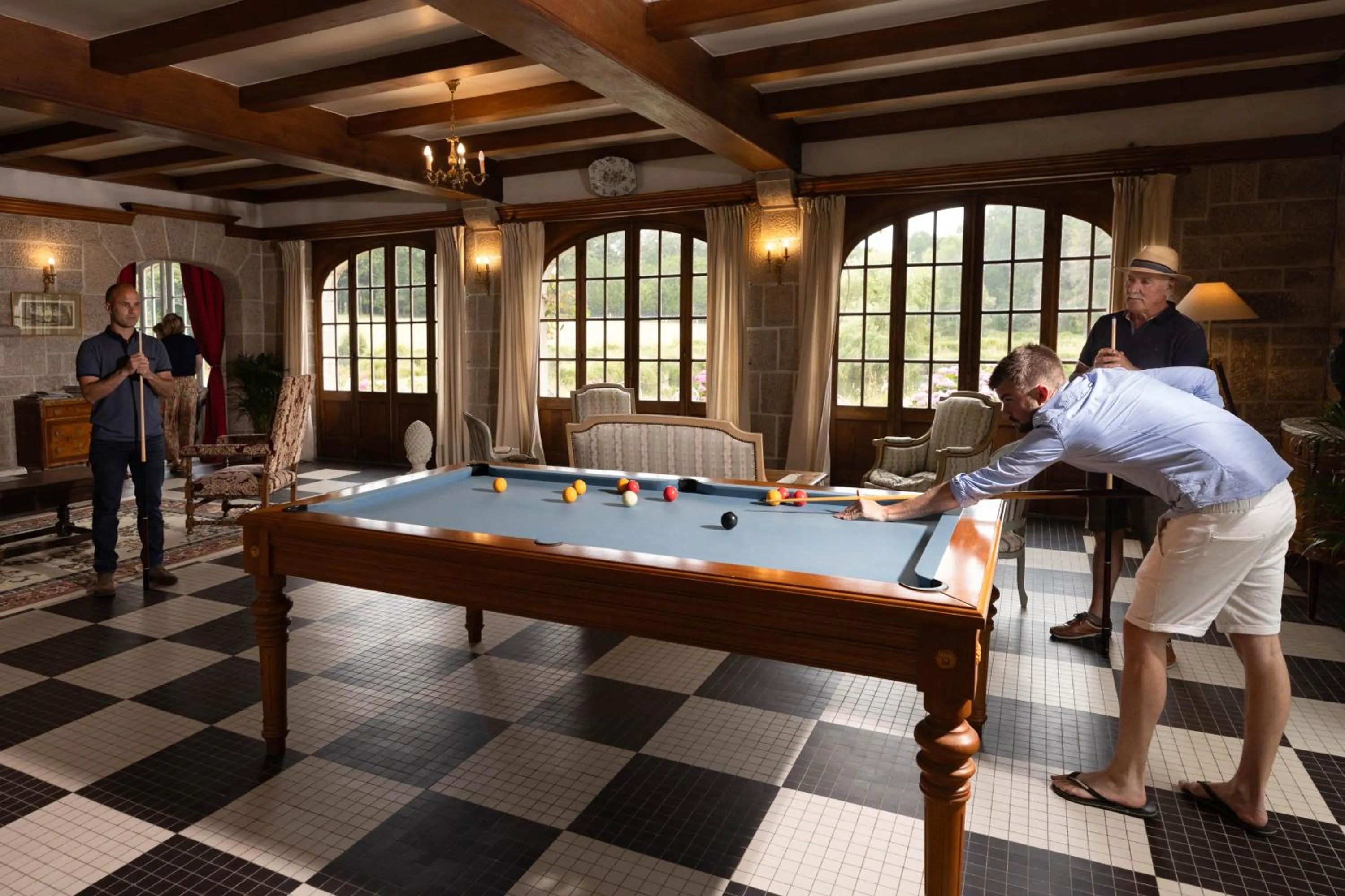 Communal lounge/ TV room in Manoir Du Stang