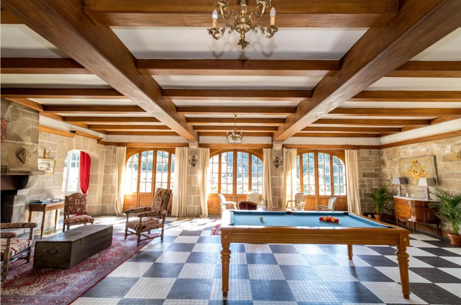 Communal lounge/ TV room in Manoir Du Stang