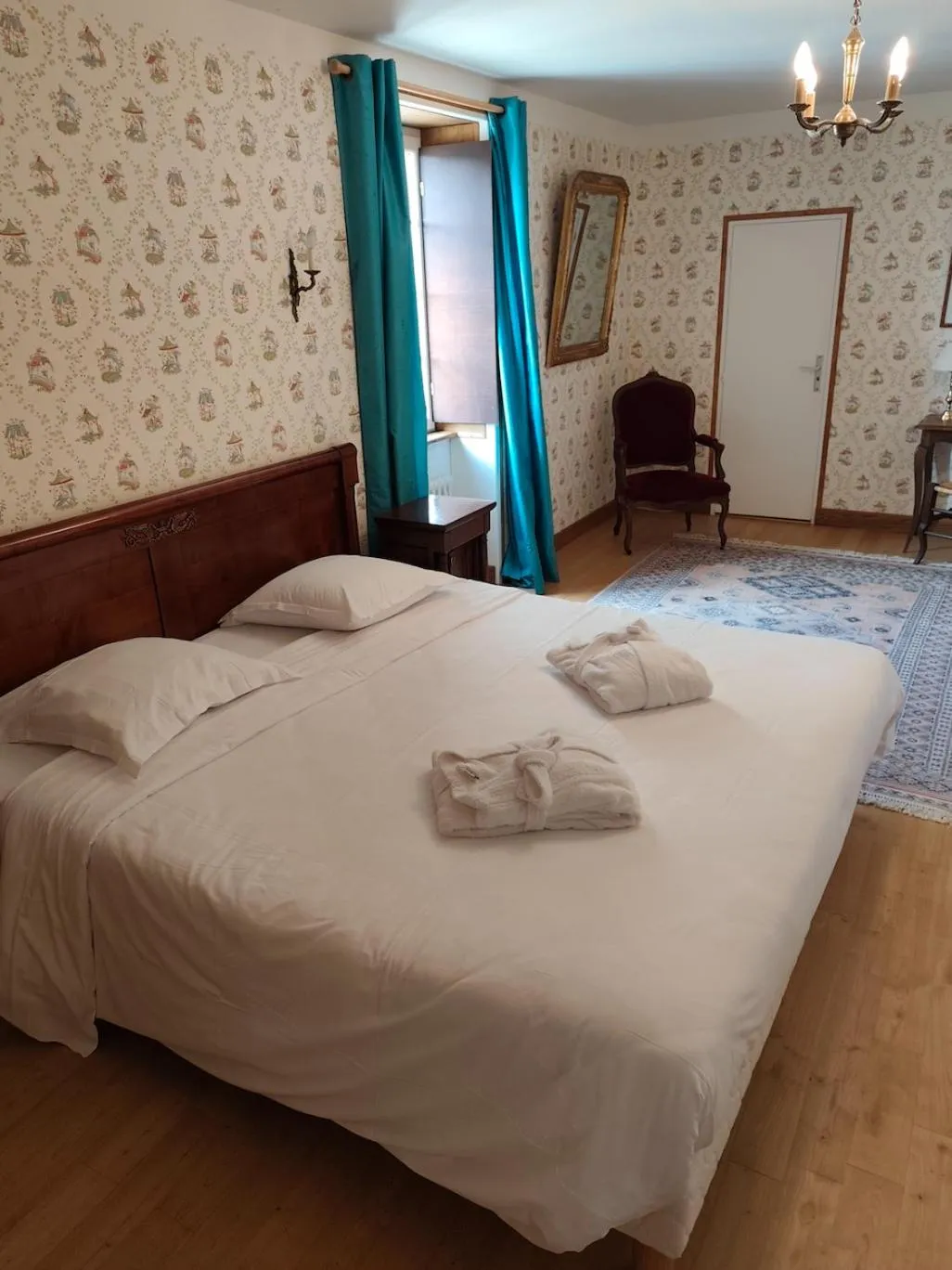 Photo of the whole room, Bed in Manoir Du Stang