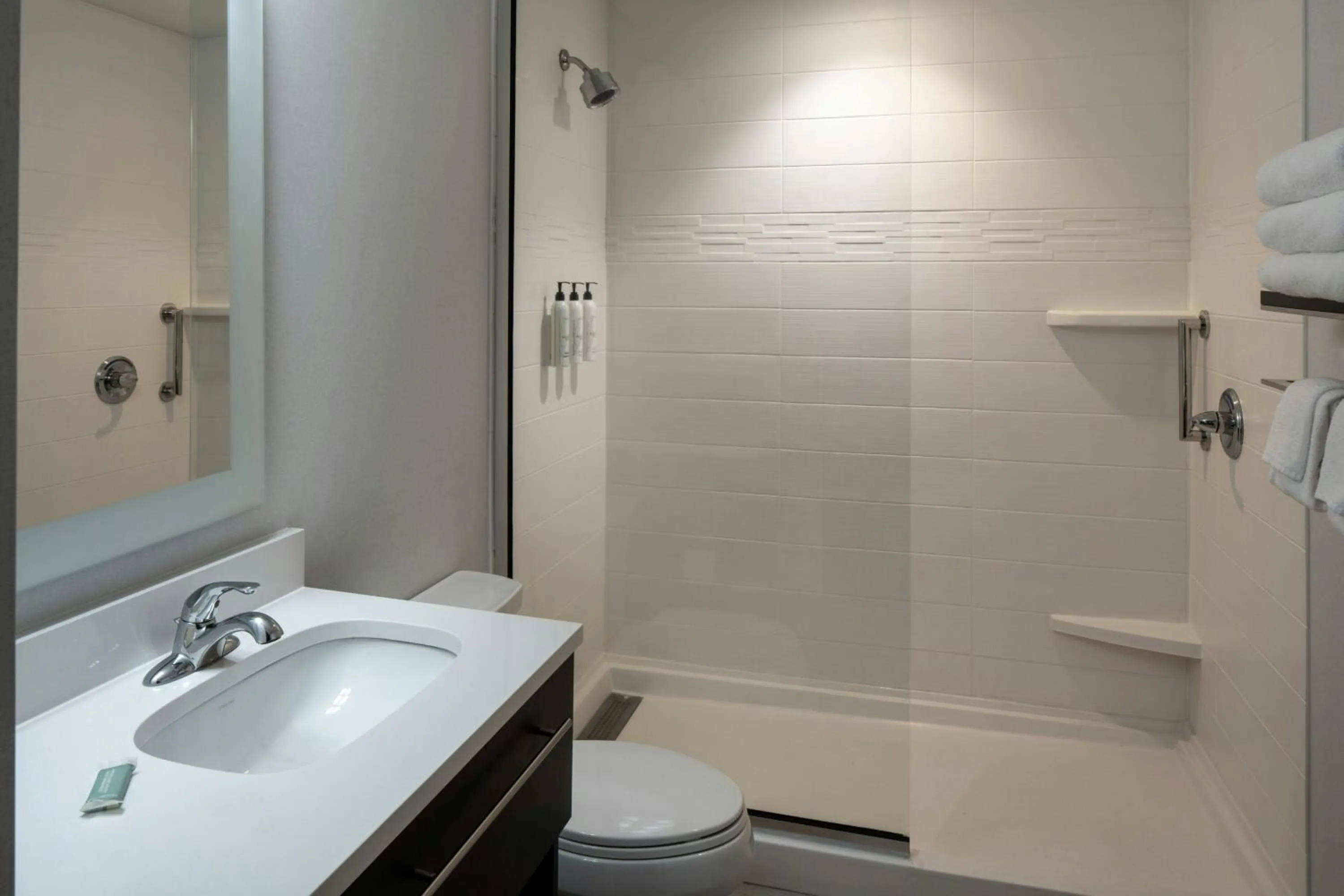 Bathroom in TownePlace Suites by Marriott Foley at OWA