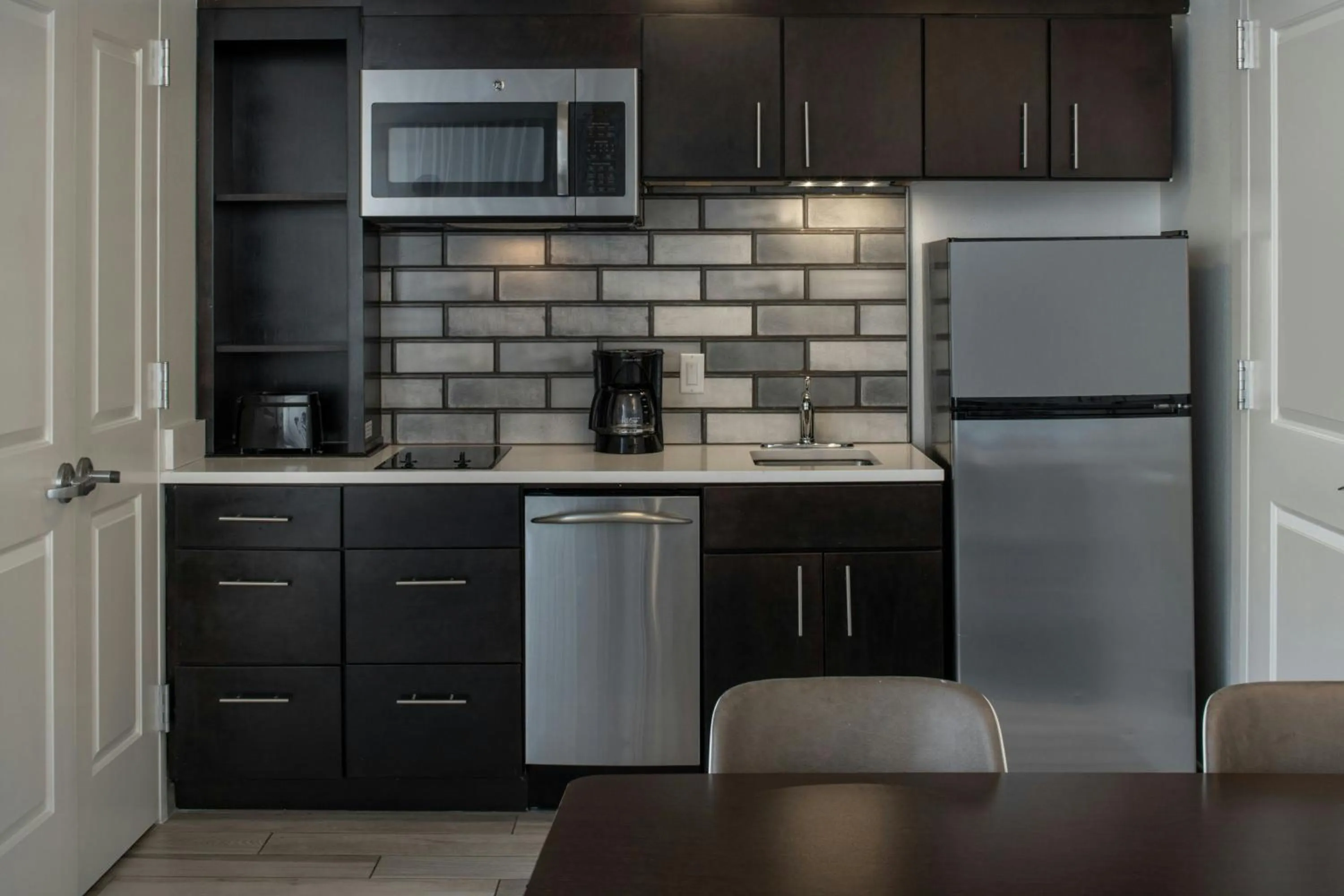 Kitchen or kitchenette in TownePlace Suites by Marriott Foley at OWA