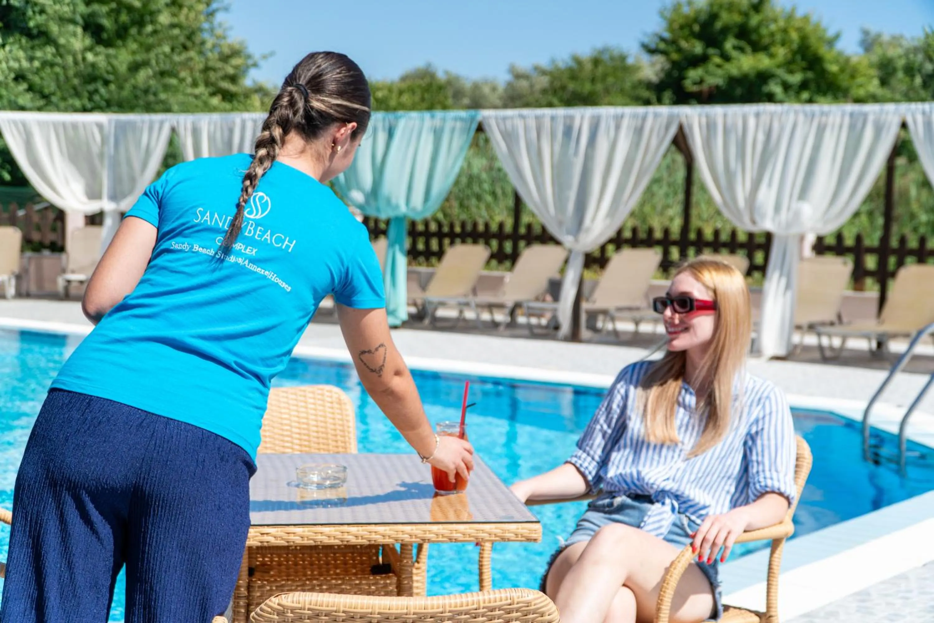 Staff in Sandy Beach Complex - Poolside Studios & Seaside Apartments