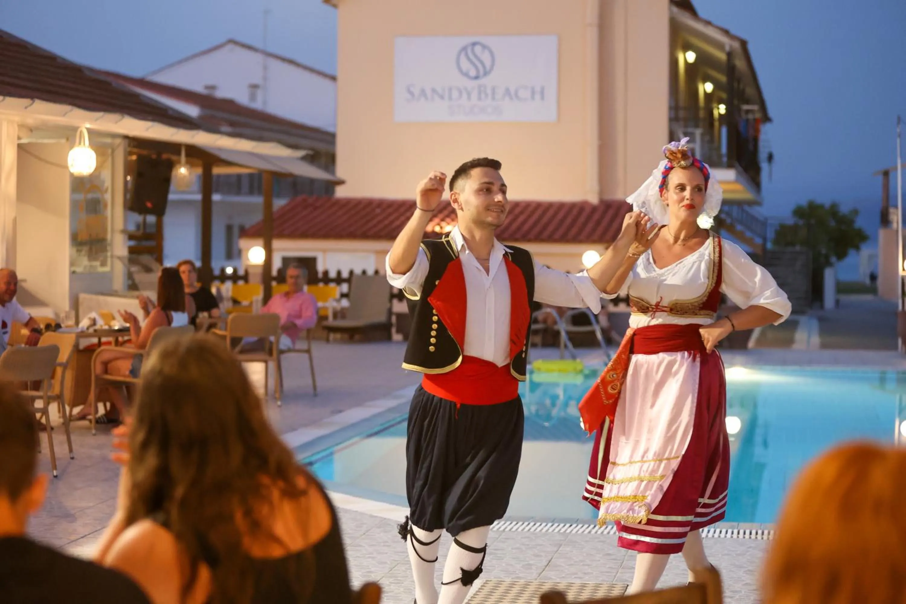 People in Sandy Beach Complex - Poolside Studios & Seaside Apartments