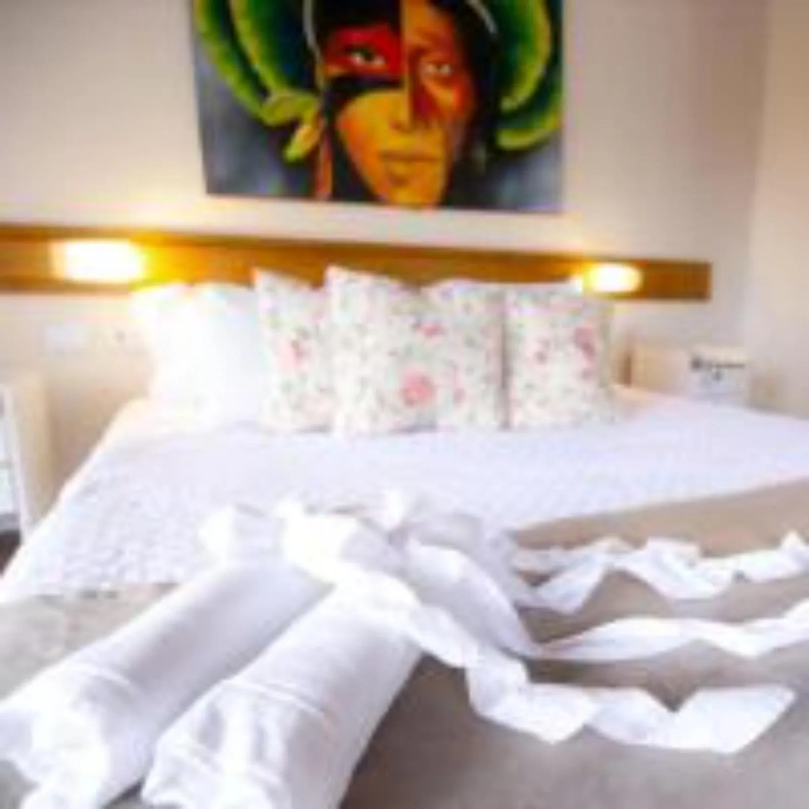 Bed in Pousada Amancay