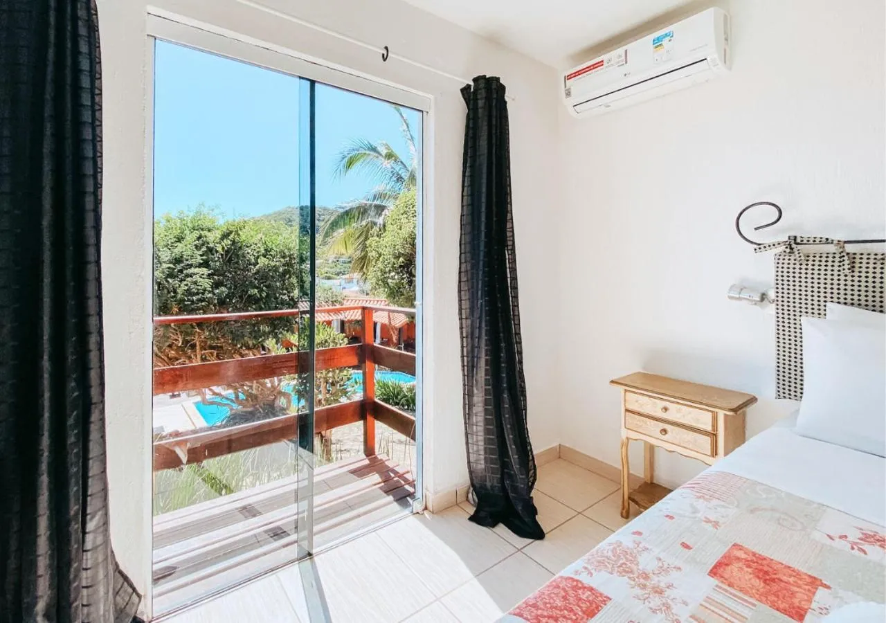 Bed in Calador Búzios Hotel