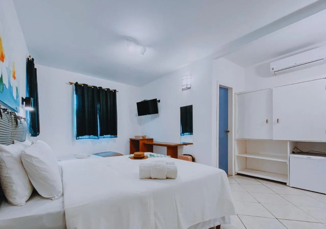 Bed in Calador Búzios Hotel