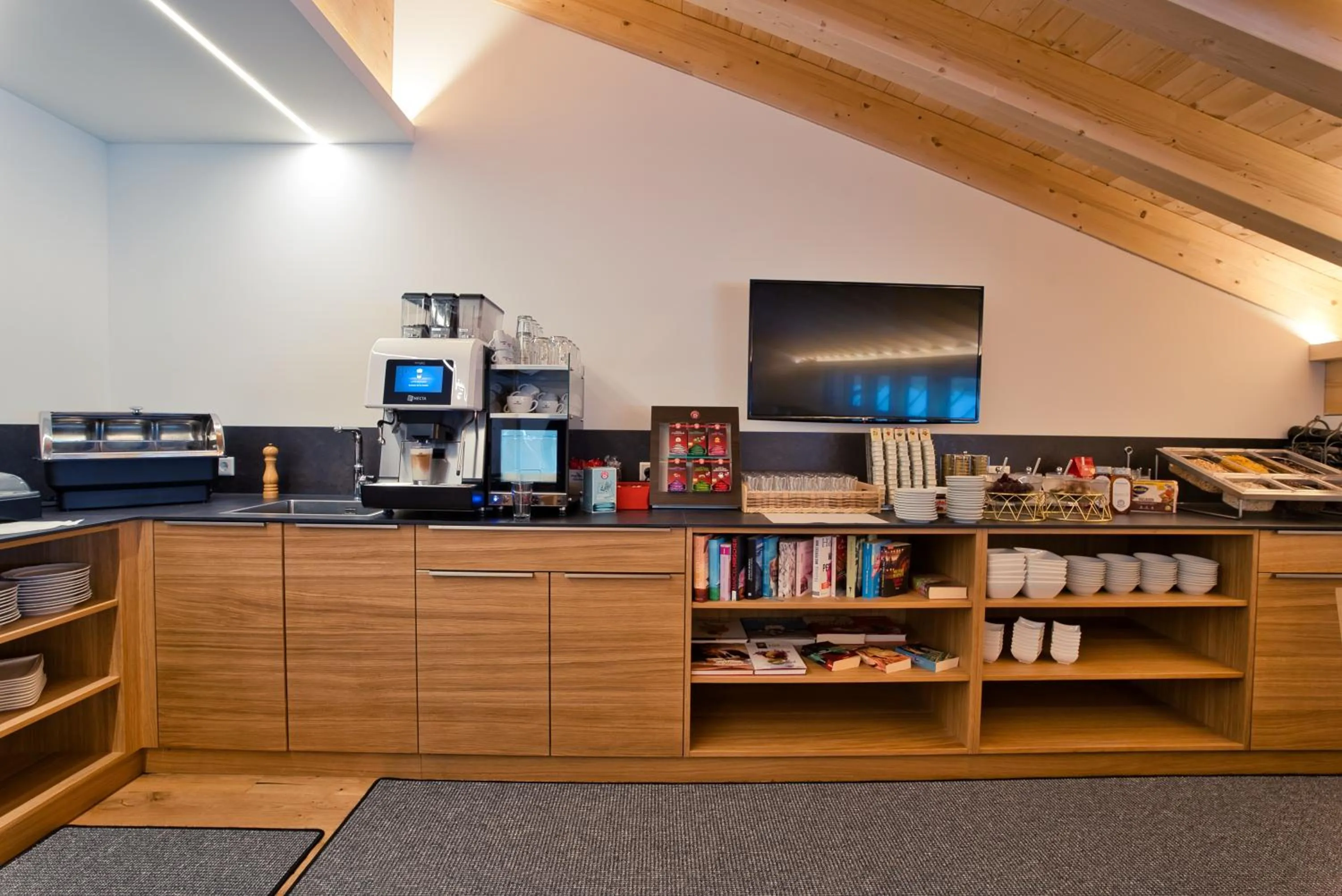 Communal lounge/ TV room in Rössle Appartements und Sport Rössle Skiverleih & Sportgeschäft