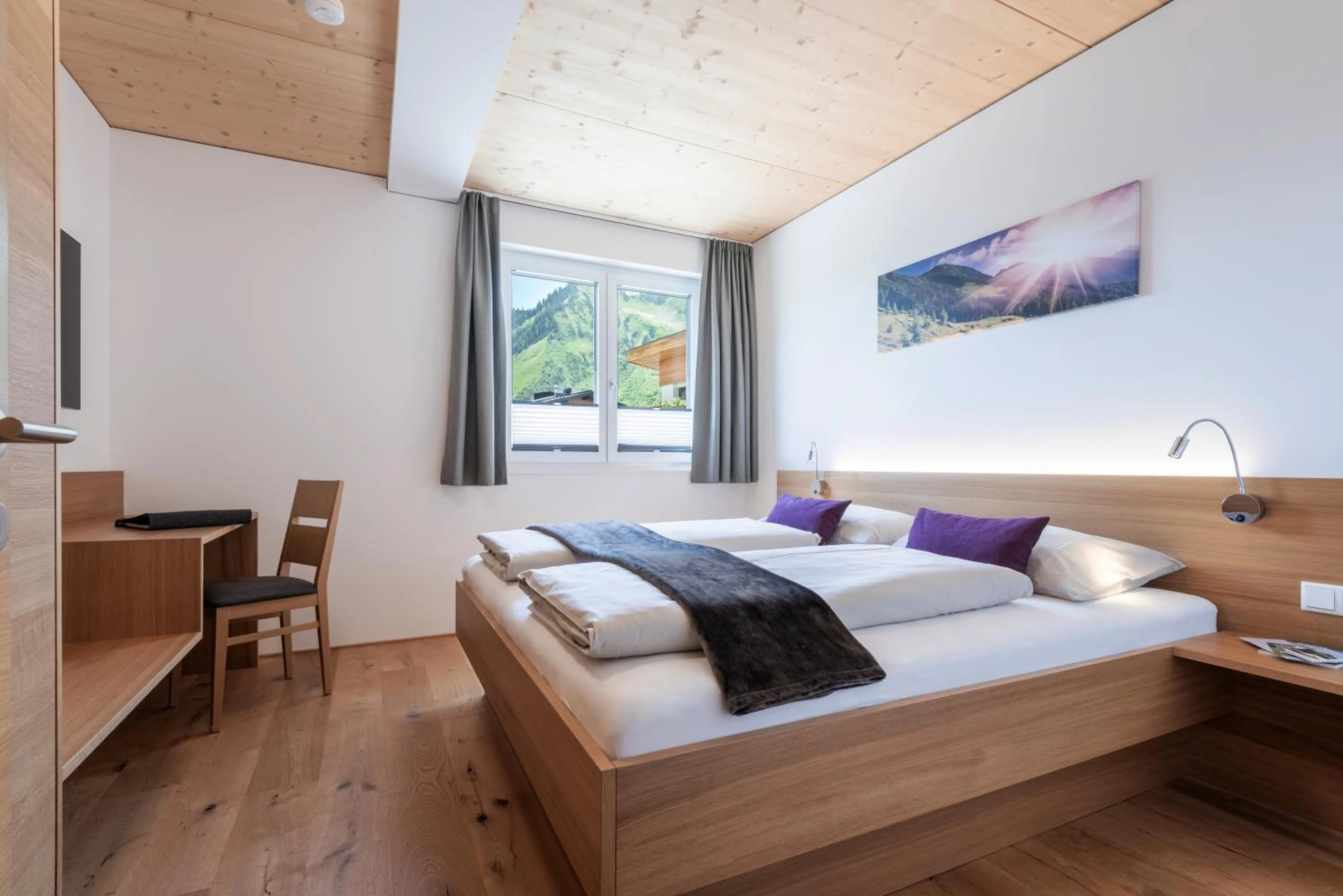Photo of the whole room, Bed in Rössle Appartements und Sport Rössle Skiverleih & Sportgeschäft