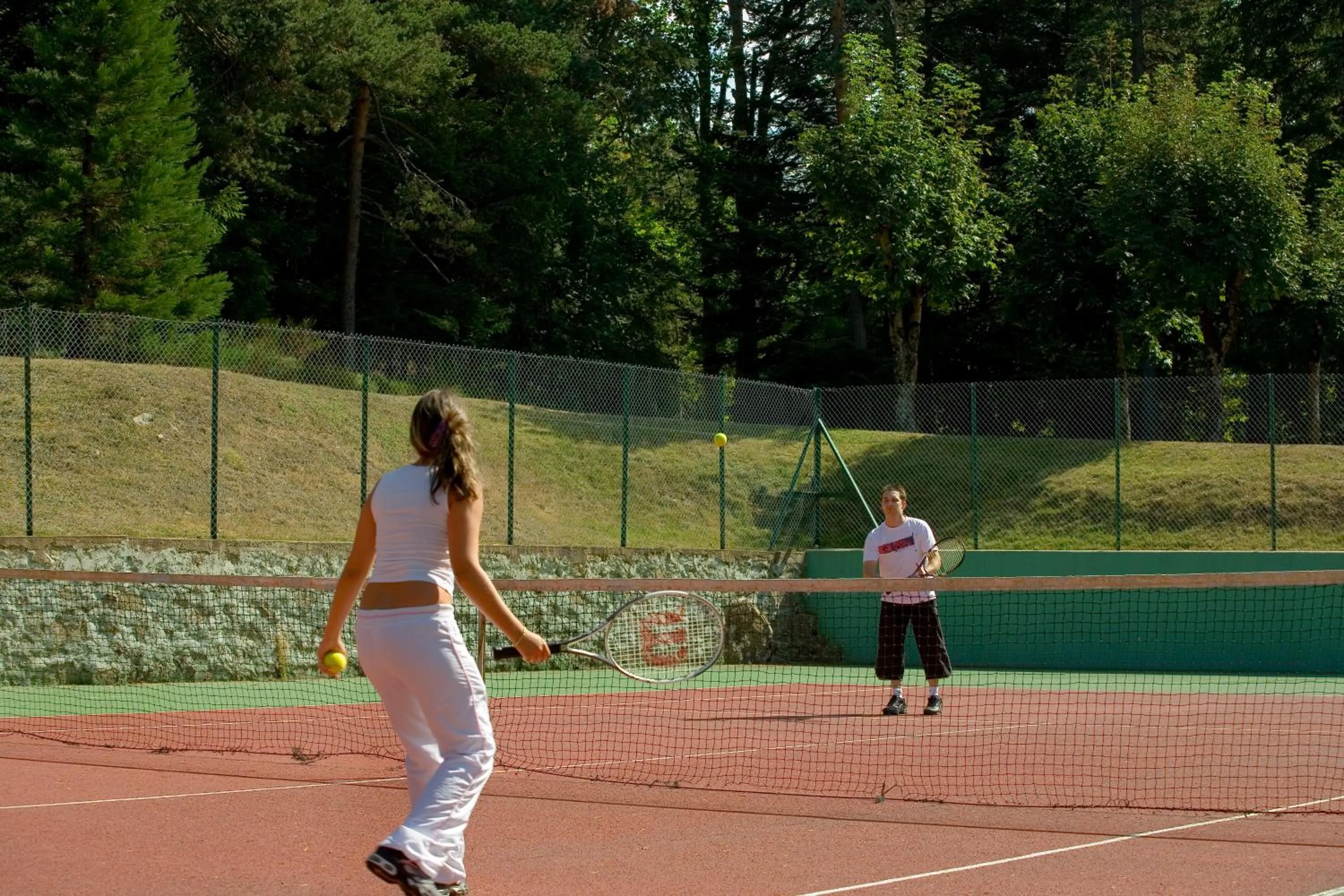 Tennis court in Logis Hôtel Clair Matin