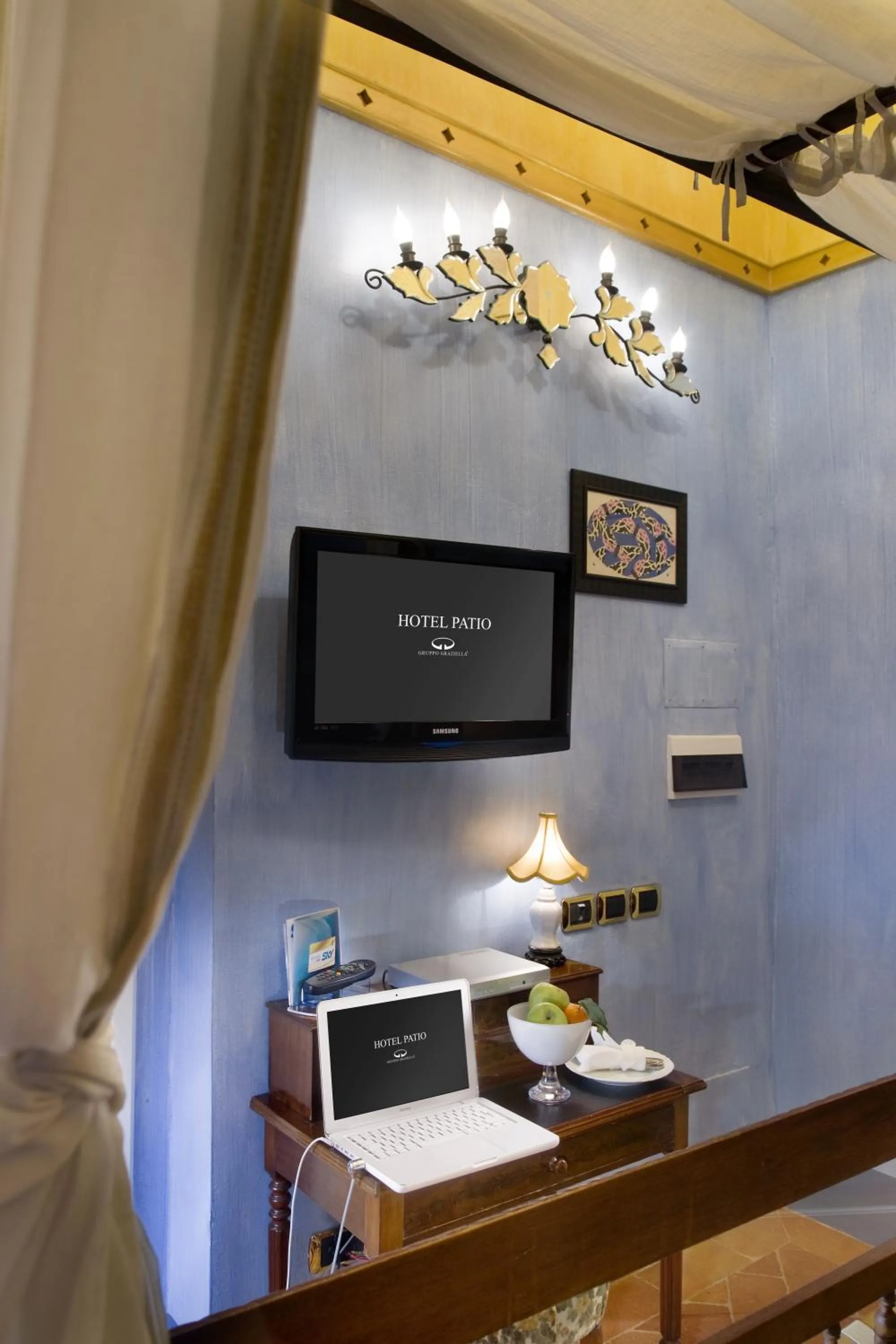 TV and multimedia in Graziella Patio Hotel