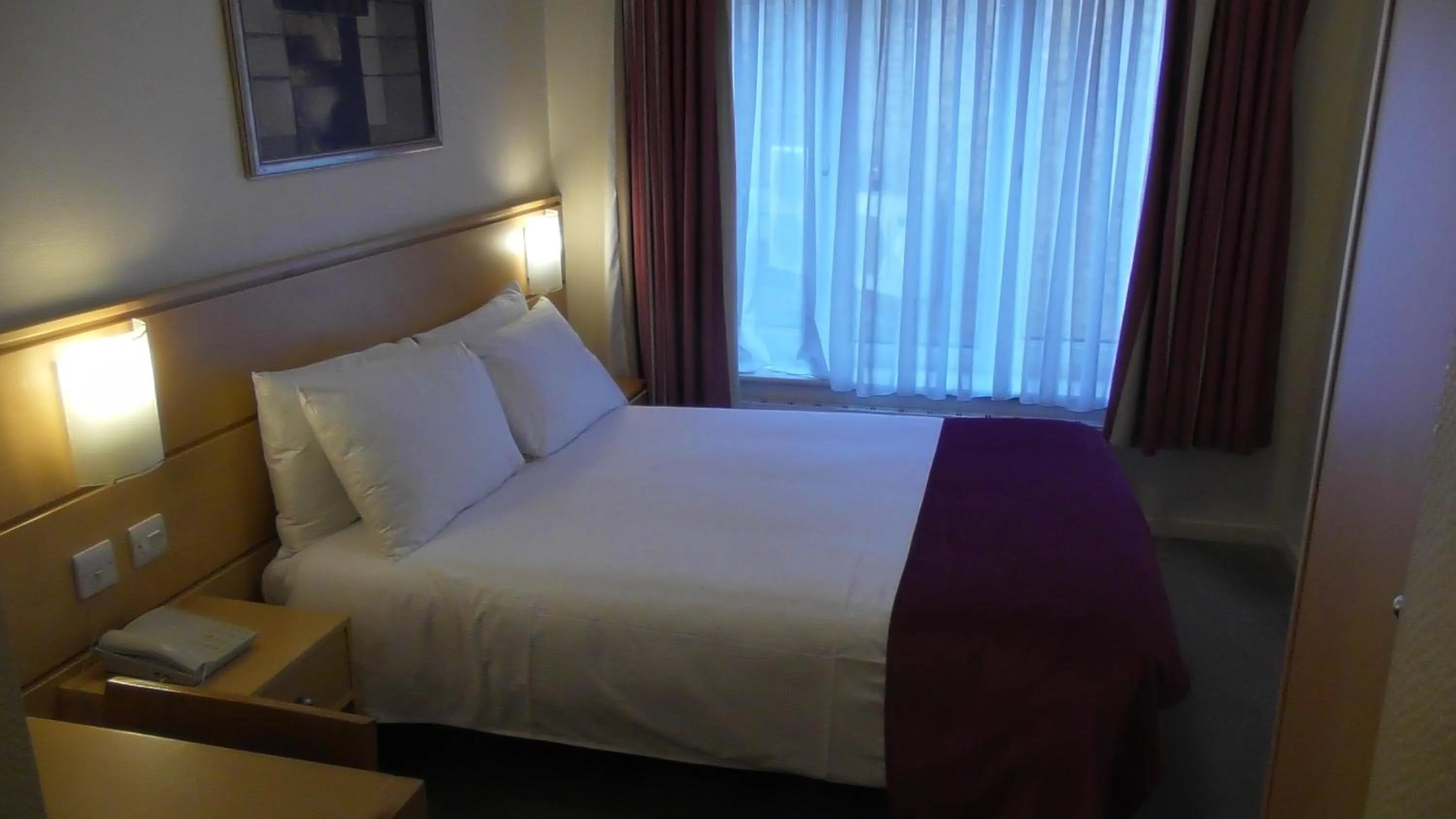 Bed in Americana Hotel